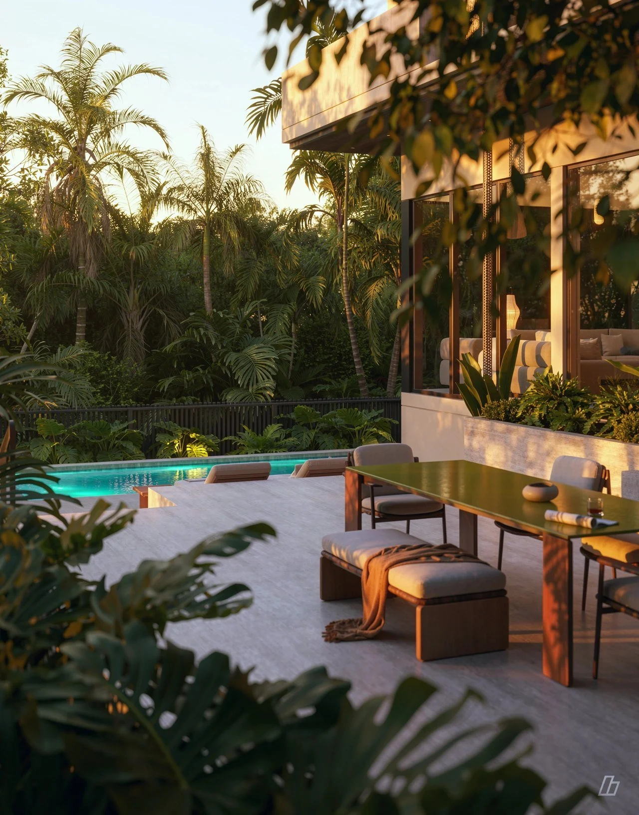 Dining terrace at dusk, with the pool beyond