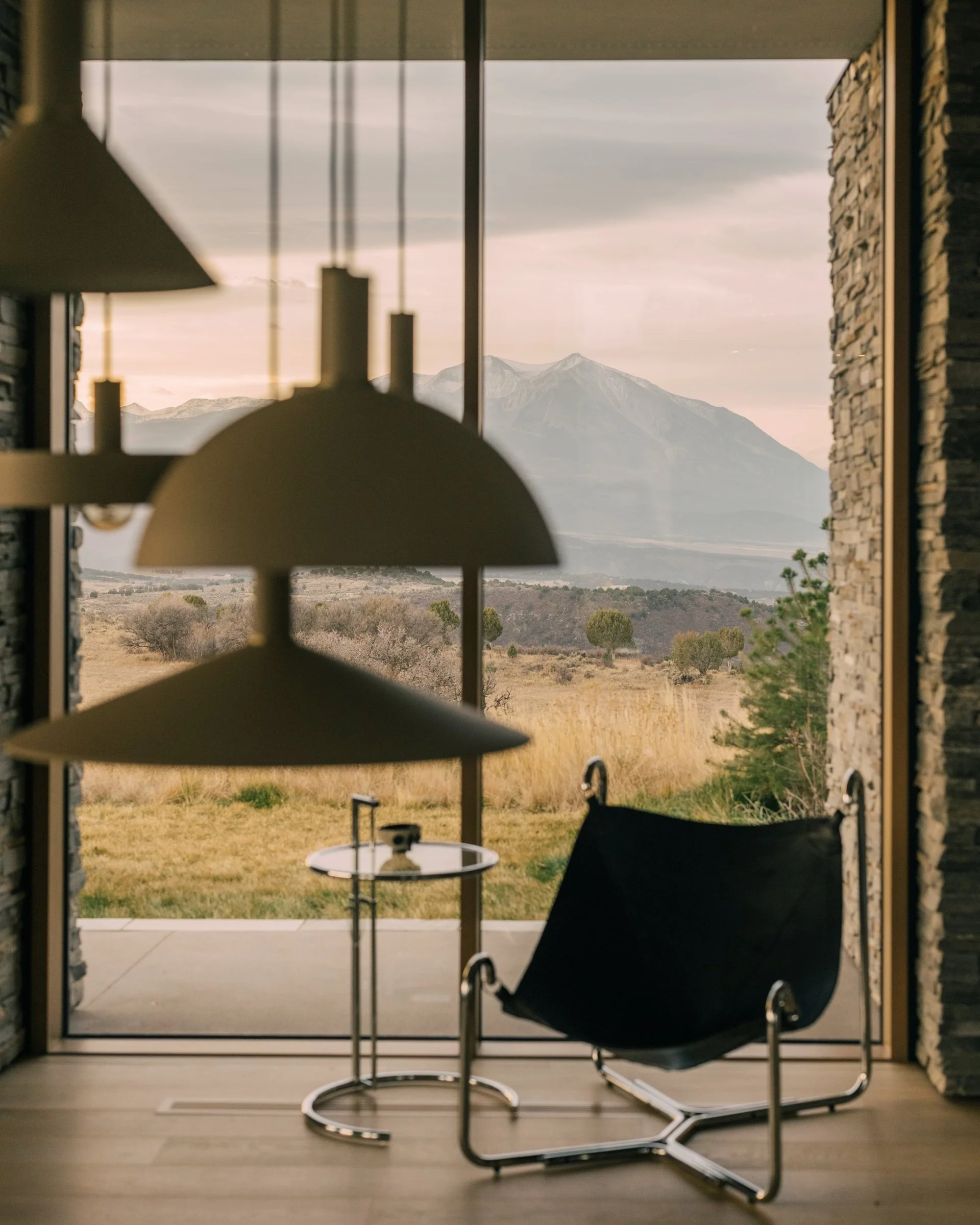 Stone jamb framing a view of the mountain