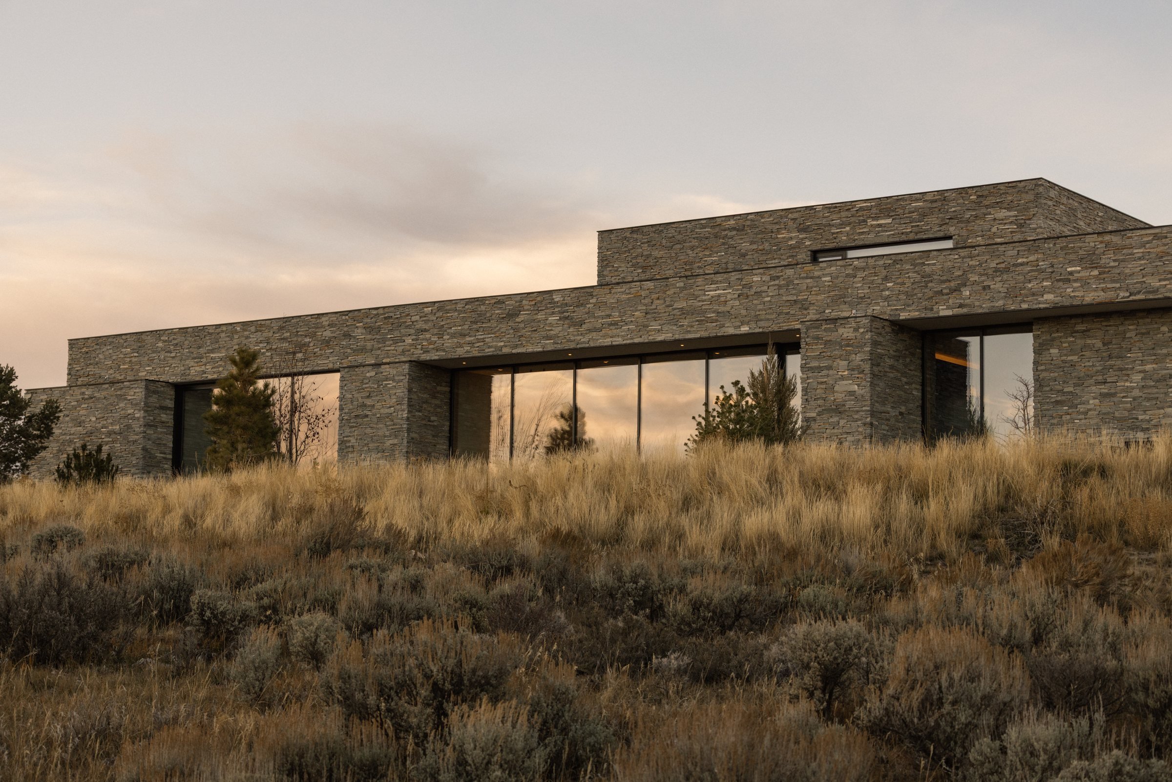 Stone house in the sagebrush at dusk