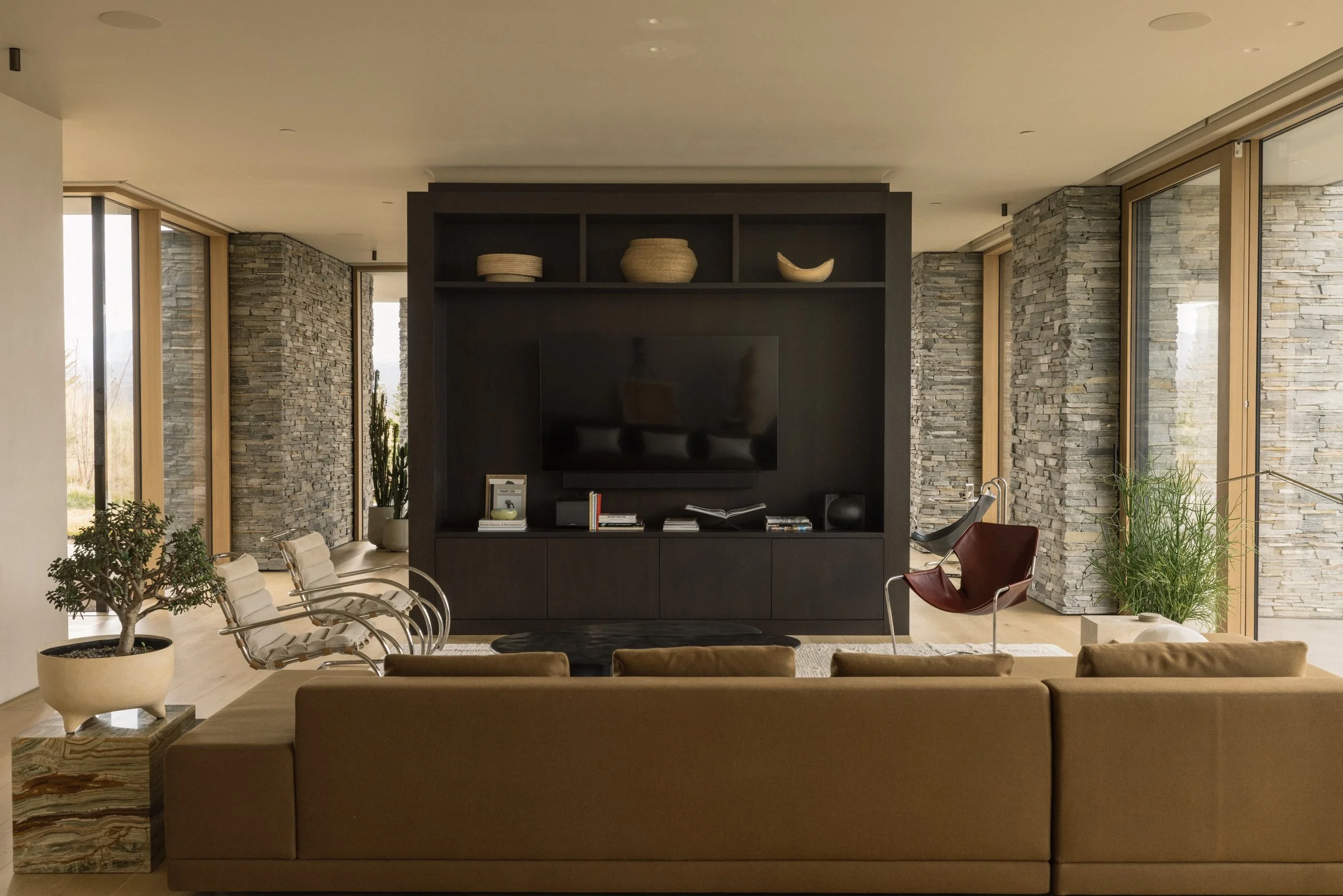 Sitting room with a dark oak media wall