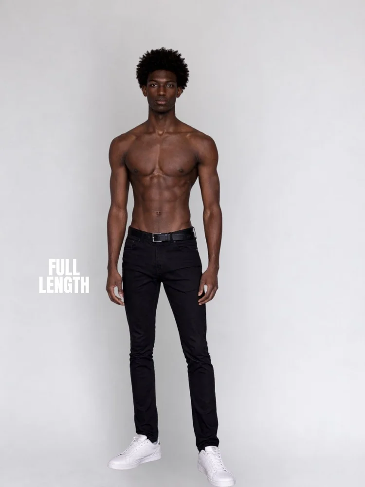 Male model standing in black trousers and white shoes, a full-length digital example