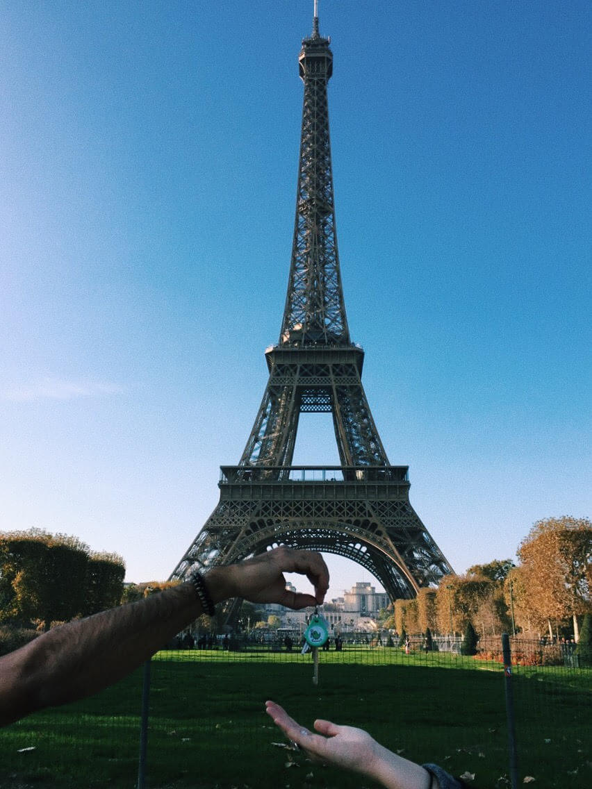 Airbnb host and guest exchanging keys in Paris