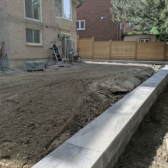 Progress on the side of the house: We removed old concrete steps, laid new gravel and installed brand new steps leading up the side of the house. We flanked the steps with river rock to finish the look.

Ready for your own transformation? Call us for