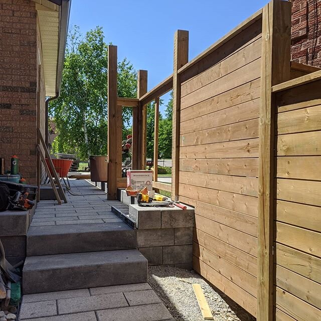 Some more progress pictures from the Newmarket project. Got the side retaining wall and walkway done, as well as the remaining portion of fence and the gate. Backyard patio is well under way, with central park (going to be grass in the center)almost 