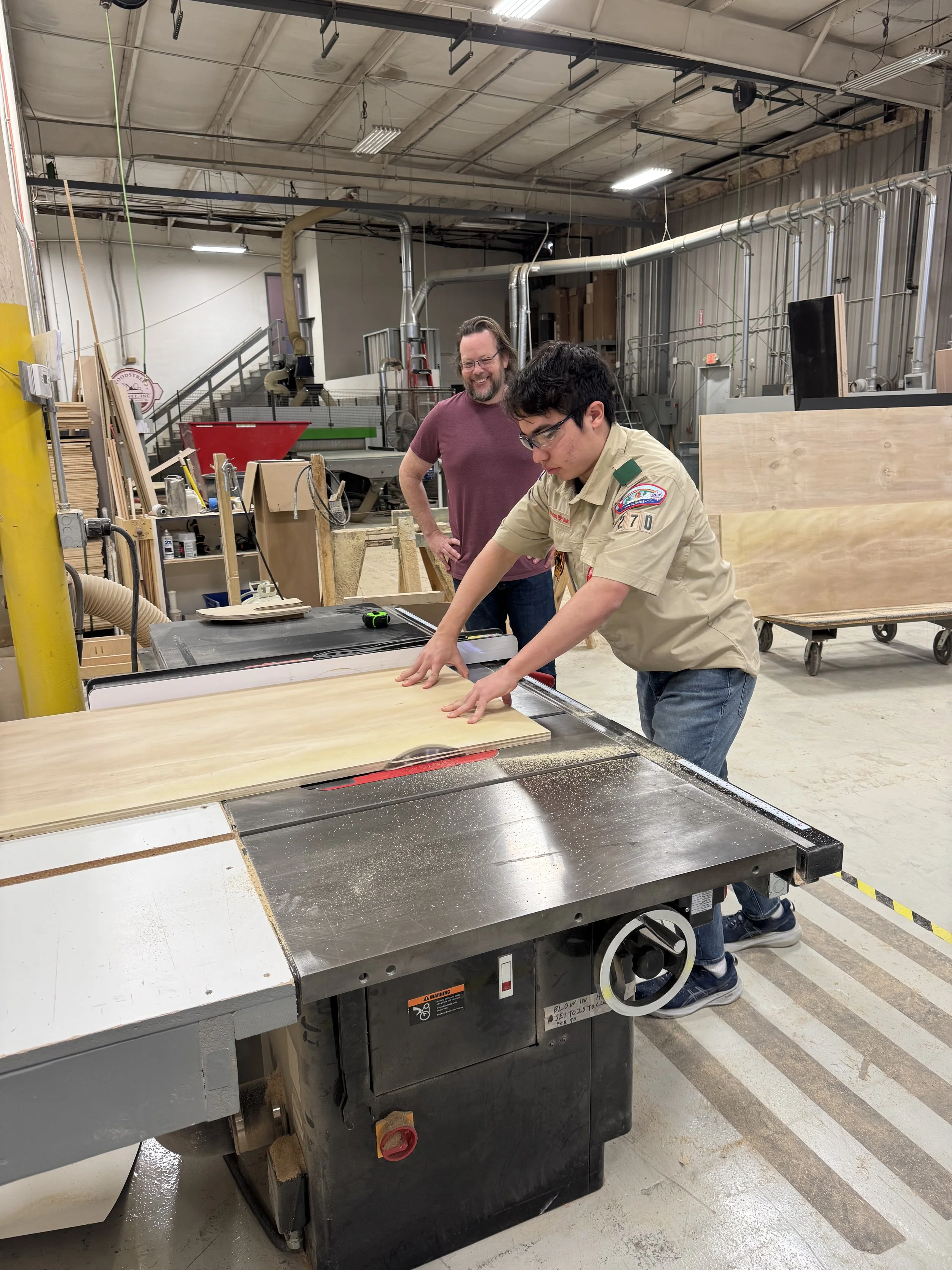 Helping Eagle Scouts earn their carpentry badge.