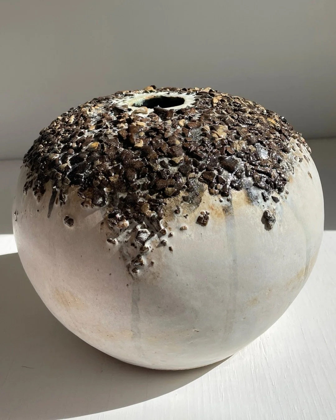 &quot;Helado&quot;
Mid fire franken clay (reclaim mix) with yellowg and white gold luster.
* I reclaim every drop of clay and usually use it to experiment with large form building and texture play like this one. This one reminds me of the ice cream t