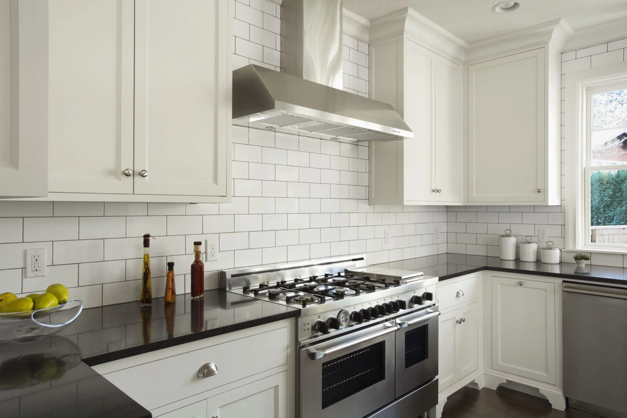 Modern-Kitchen-With-White-Subway-Tile-478427147-56a49fe65f9b58b7d0d7e2d4.jpg