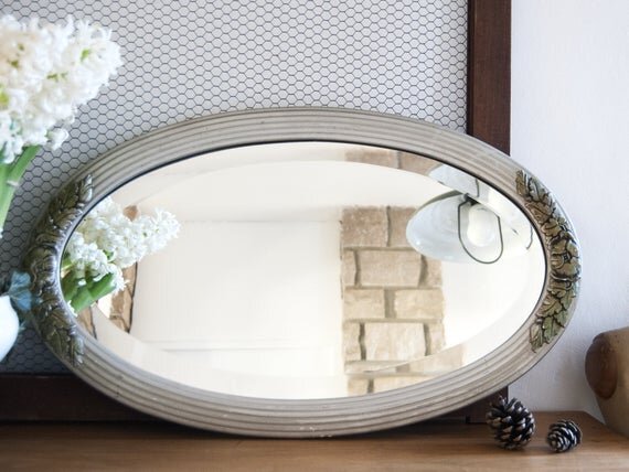 Antique wall mirror oval