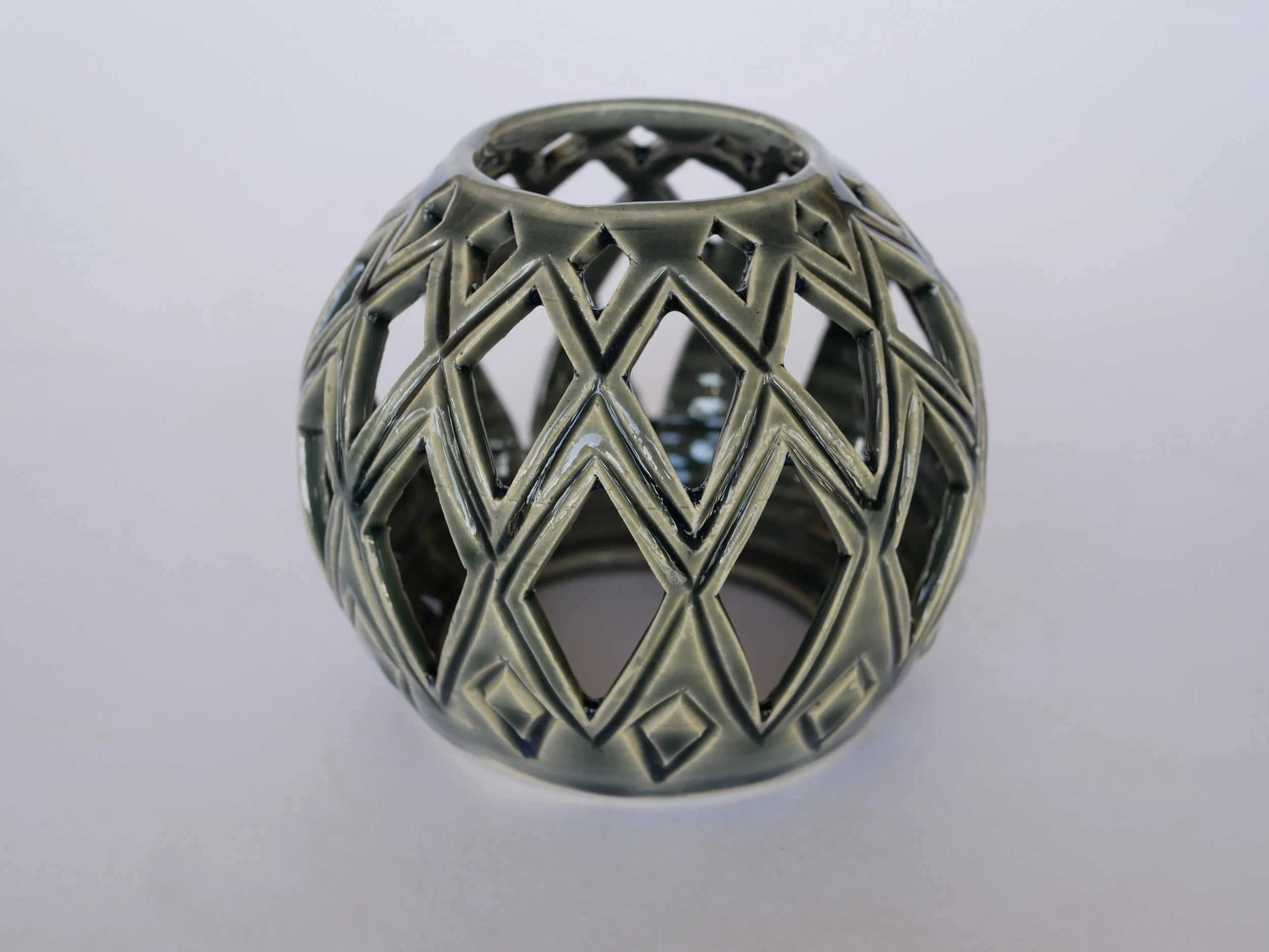 Grey diamond cutout Luminary