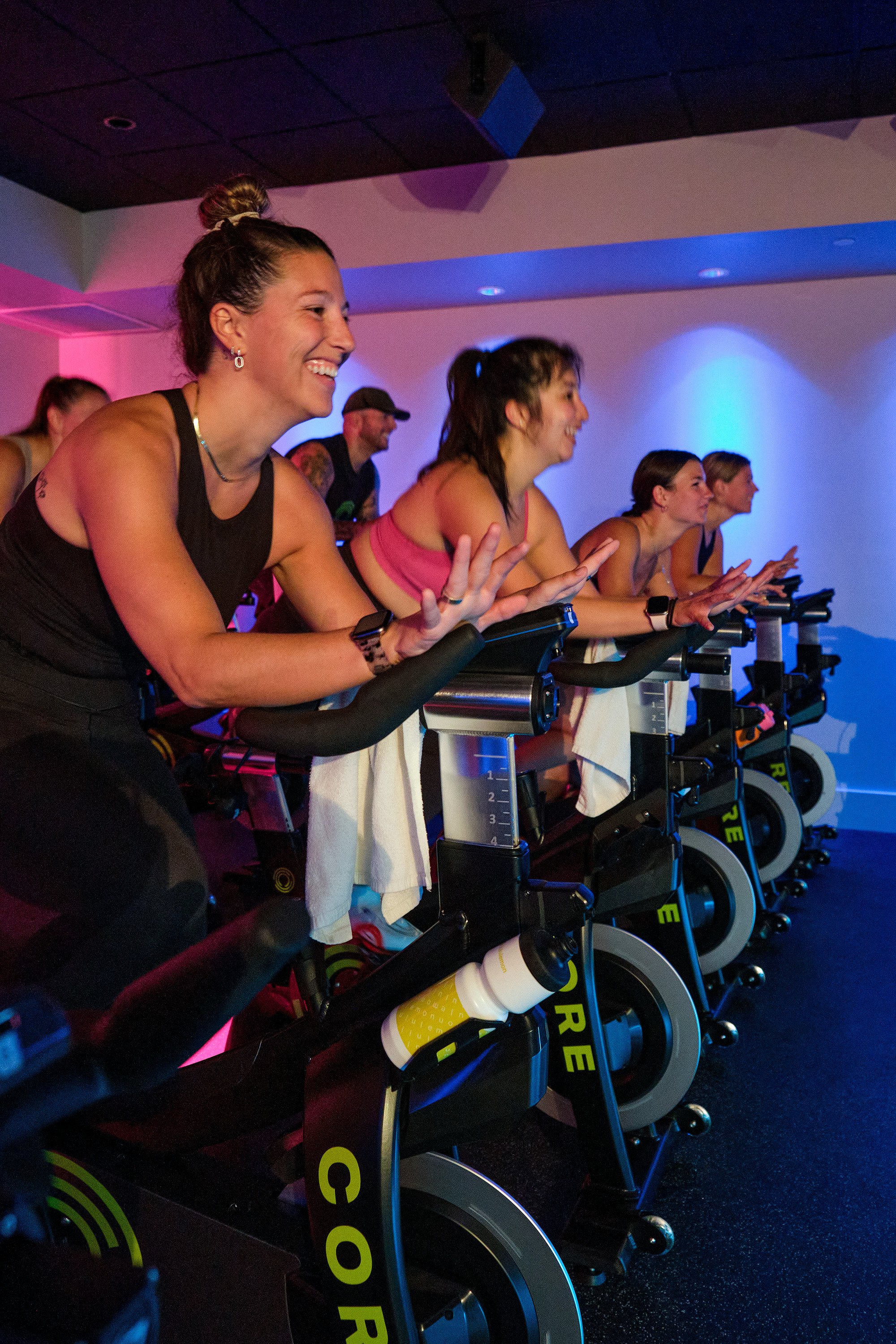 Indoor cycling theater featuring 30 custom-branded bikes, sensory illumination and a premium sound system.