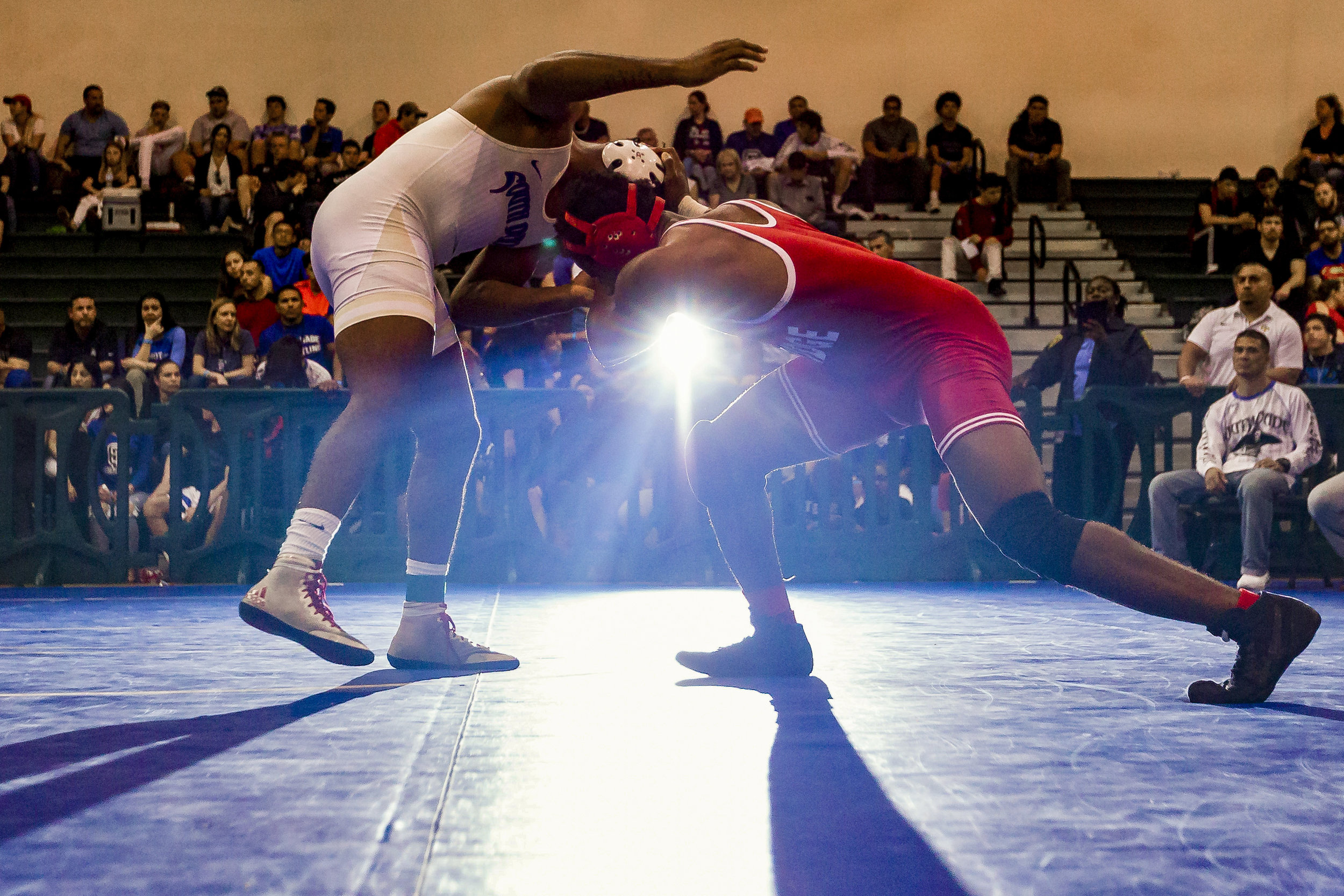  Corey Harvey, from South Dade, left, wrestles against Leonard Wooten, from Southridge, during a 182 weight class Region 4-3A wrestling finals at Ronald W. Reagan Doral Senior High School on Feb. 24, 2018. Harvey won the match. 
