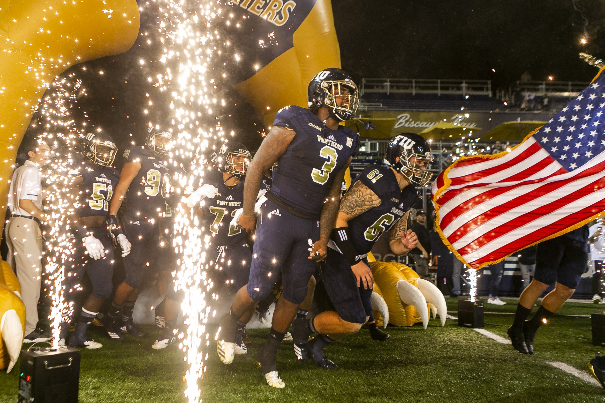  FIU linebacker Sage Lewis (3) makes his way to the field with his teammates before the start of a football game between Florida International University and Florida Atlantic University at the Riccardo Silva Stadium in Miami on Saturday, November 3, 