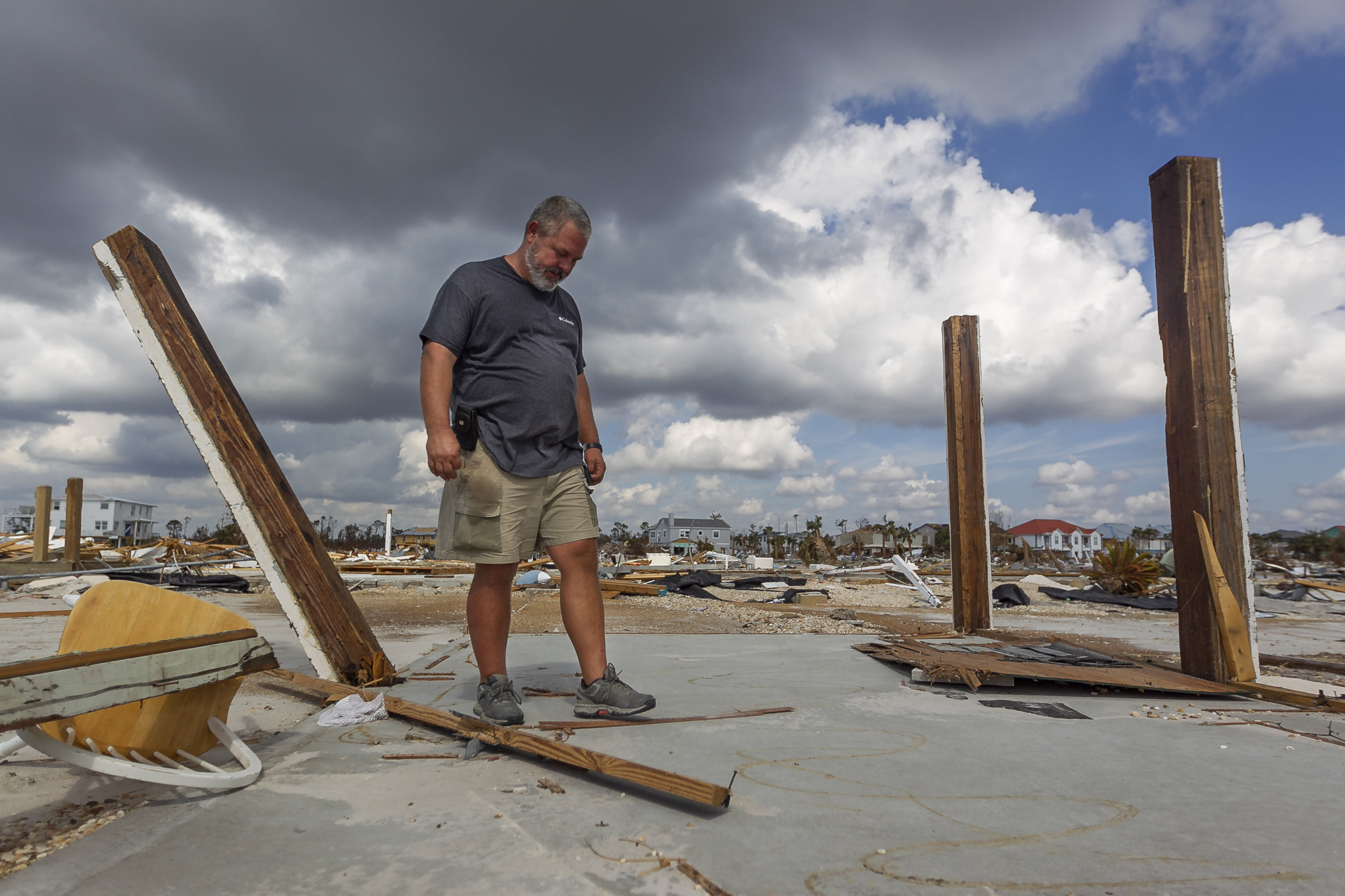  Joe Rodgers, 46, a wholesale produce salesman, surveys the remains of his rental duplex in Mexico Beach, Florida on Friday, October 19, 2018. Hurricane Michael devastated the Florida Panhandle leaving tens of thousands without food, power or shelter