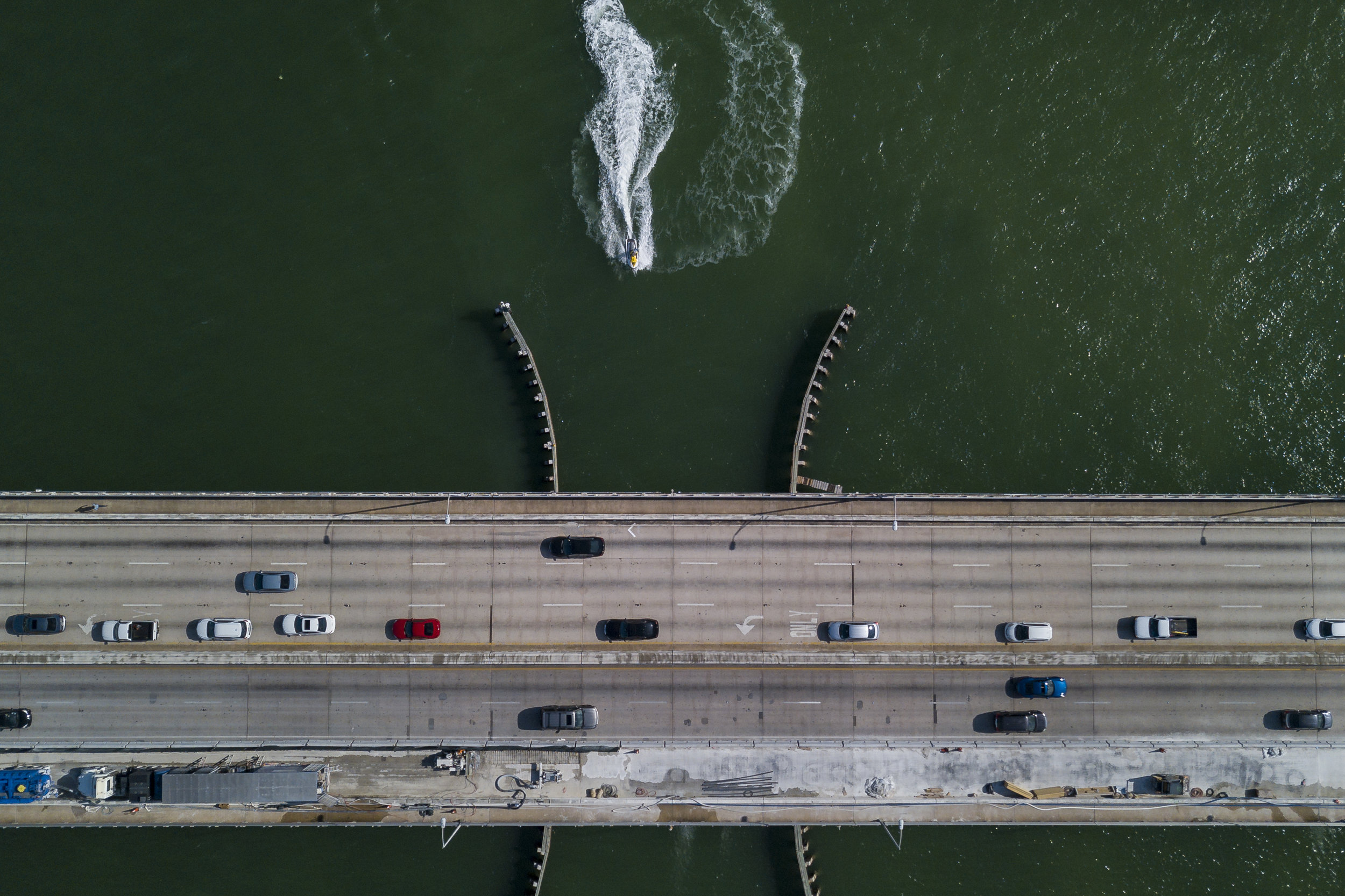  A jet skier goes under the MacArthur Causeway in Miami Beach on Wednesday, October 10, 2018. Miami Beach has proposed restrictions on jet skis and other watercraft that would ban them from going under local bridges because they can cause corrosion. 