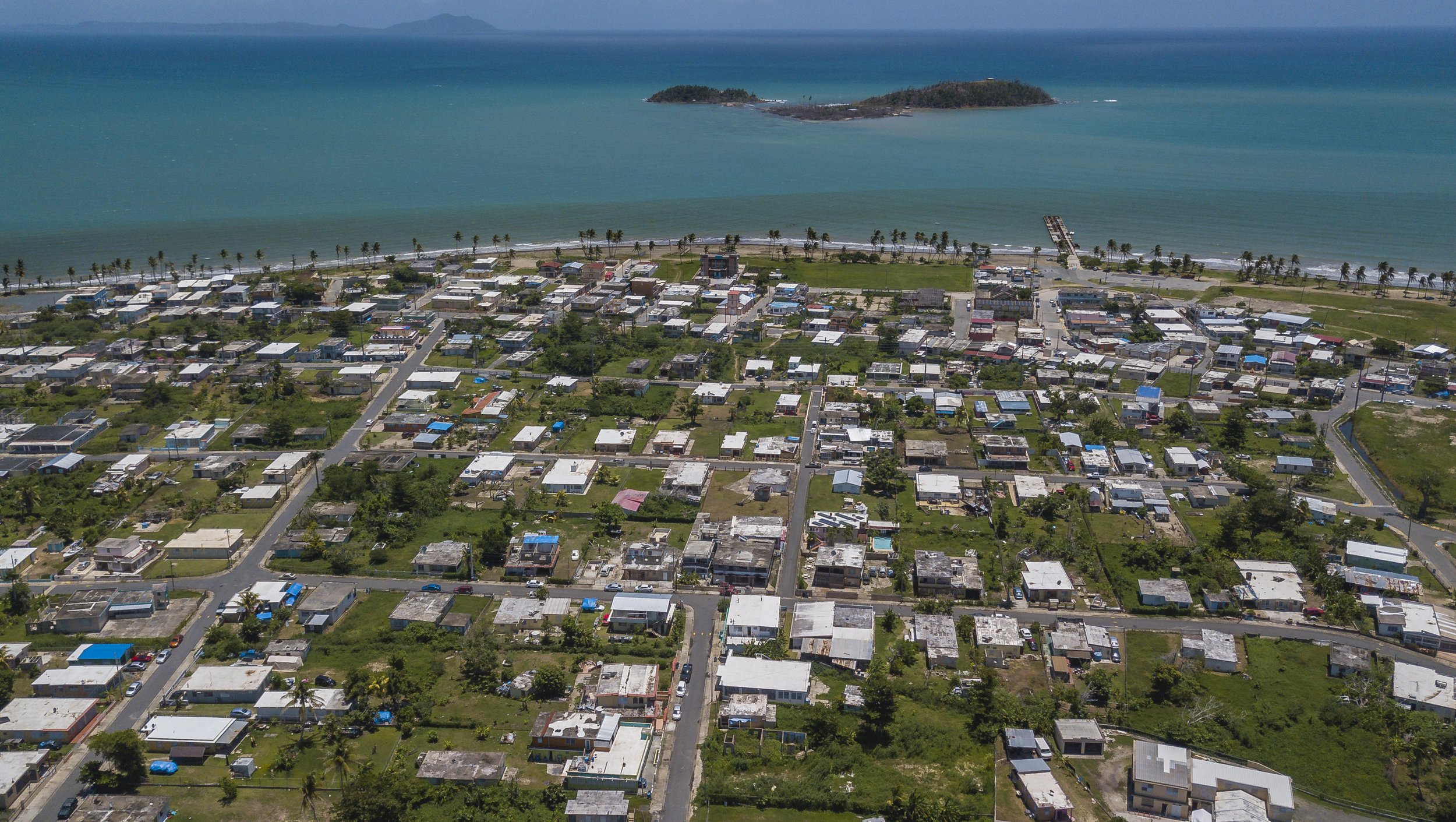  Punta Santiago, Humacao on August 23, 2018. Hurricane Maria devastated the seaside community and a year later homes with blue tarps await new roofs. 