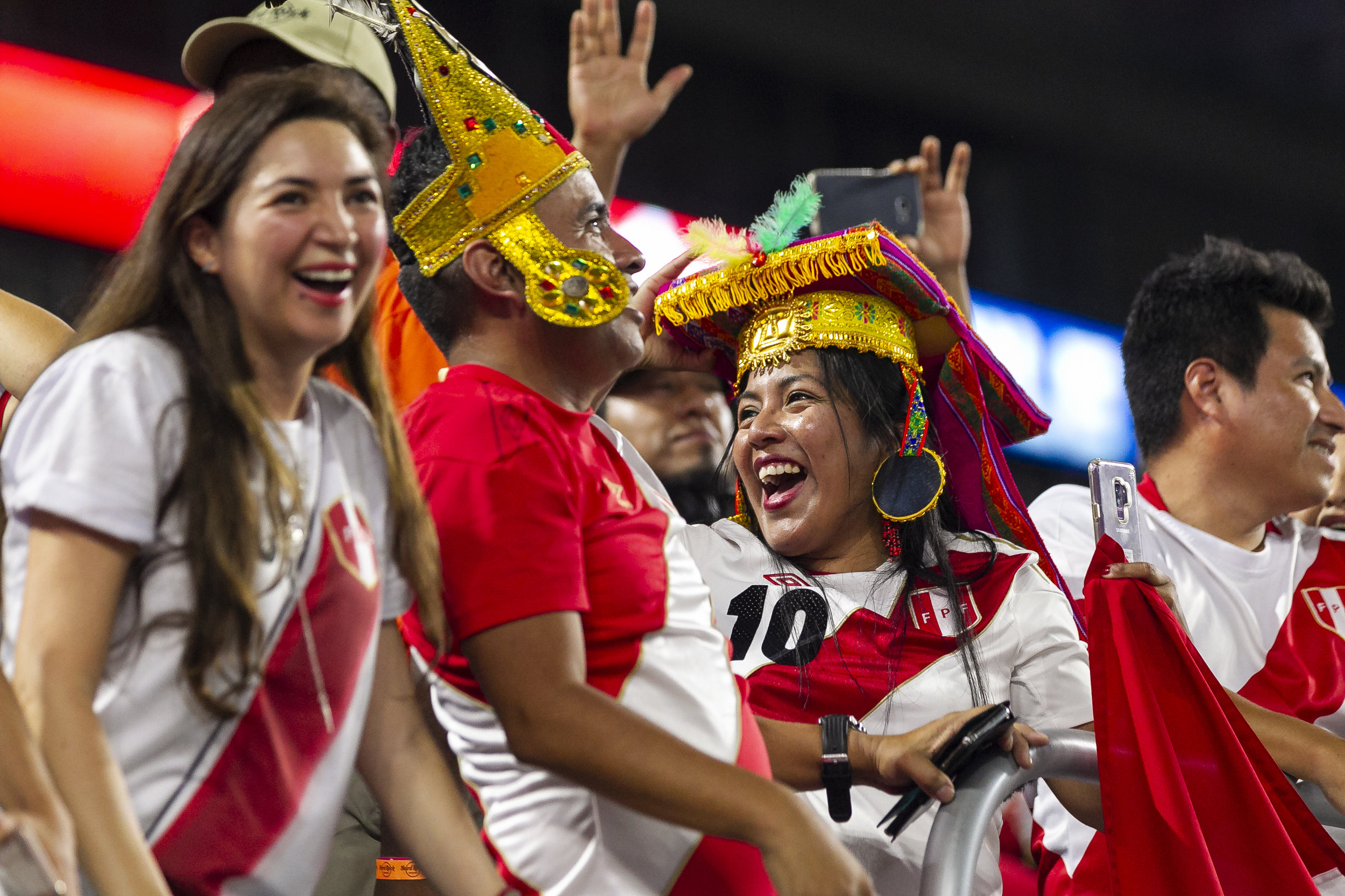  Fans celebrate before the start of a friendly soccer match between Peru and Chile at Hard Rock Stadium in Miami Gardens on Friday, Oct. 12, 2018. 