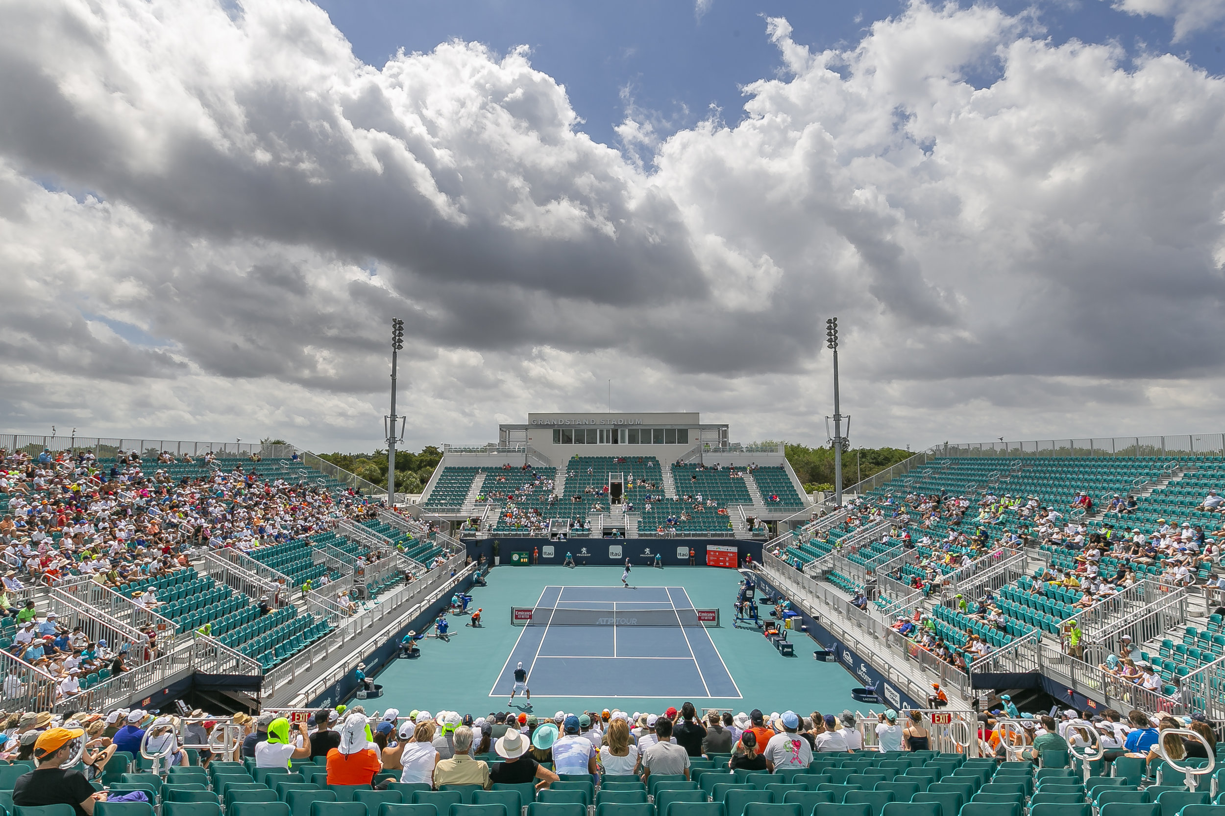  Attendees watch a match between Joao Sousa, of Portugal, and Kevin Anderson, of South Africa, during their match at the Miami Open tennis tournament on Monday, March 25, 2019 at Hard Rock Stadium in Miami Gardens. 