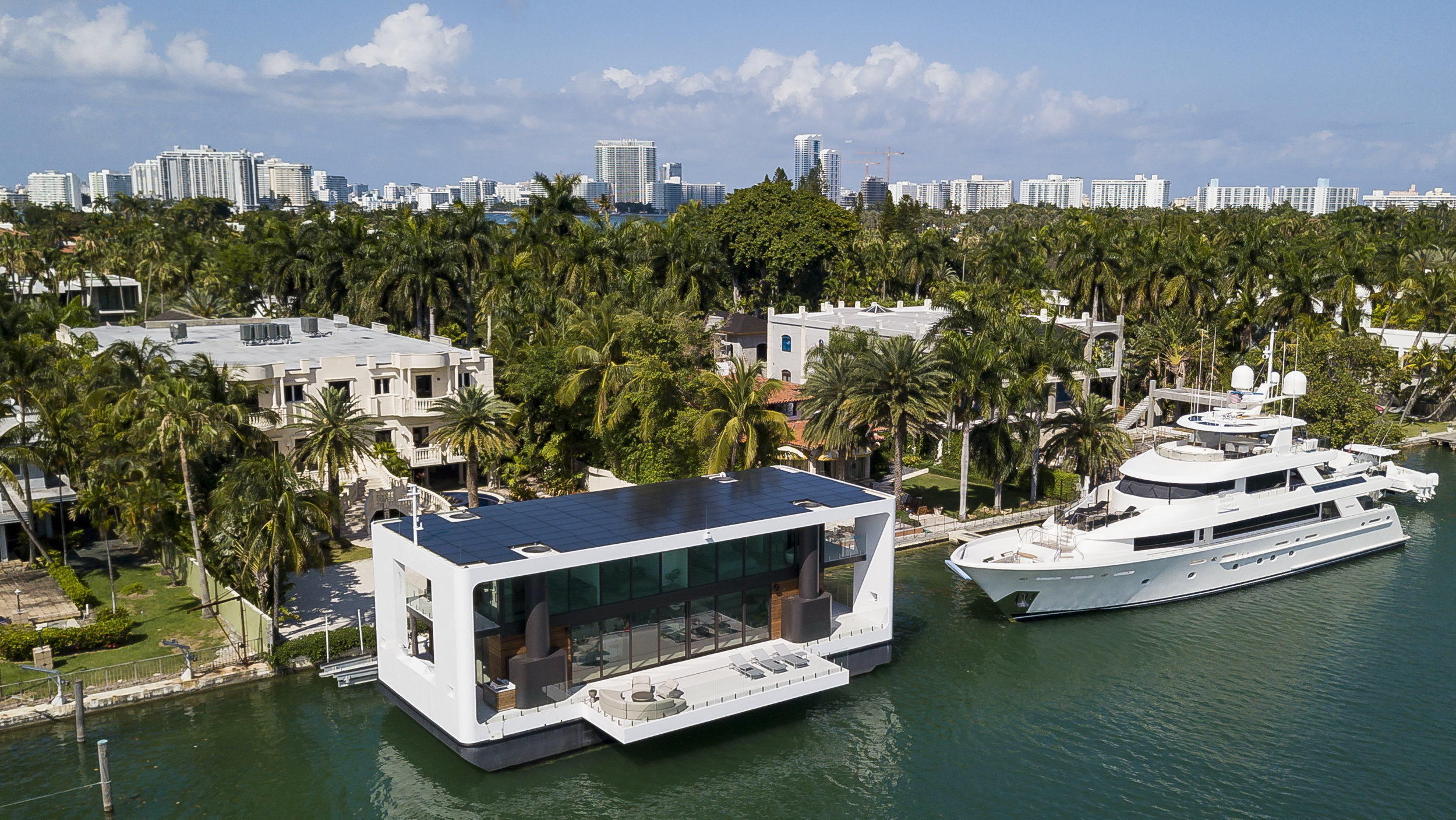  Aerial view of the Arkup houseboat, a green-energy luxury floating home that can adapt to sea rise, as it docks off Palm Island near Miami Beach on Saturday, April 27, 2019. The floating house has solar panels, impact resistant windows and can withs