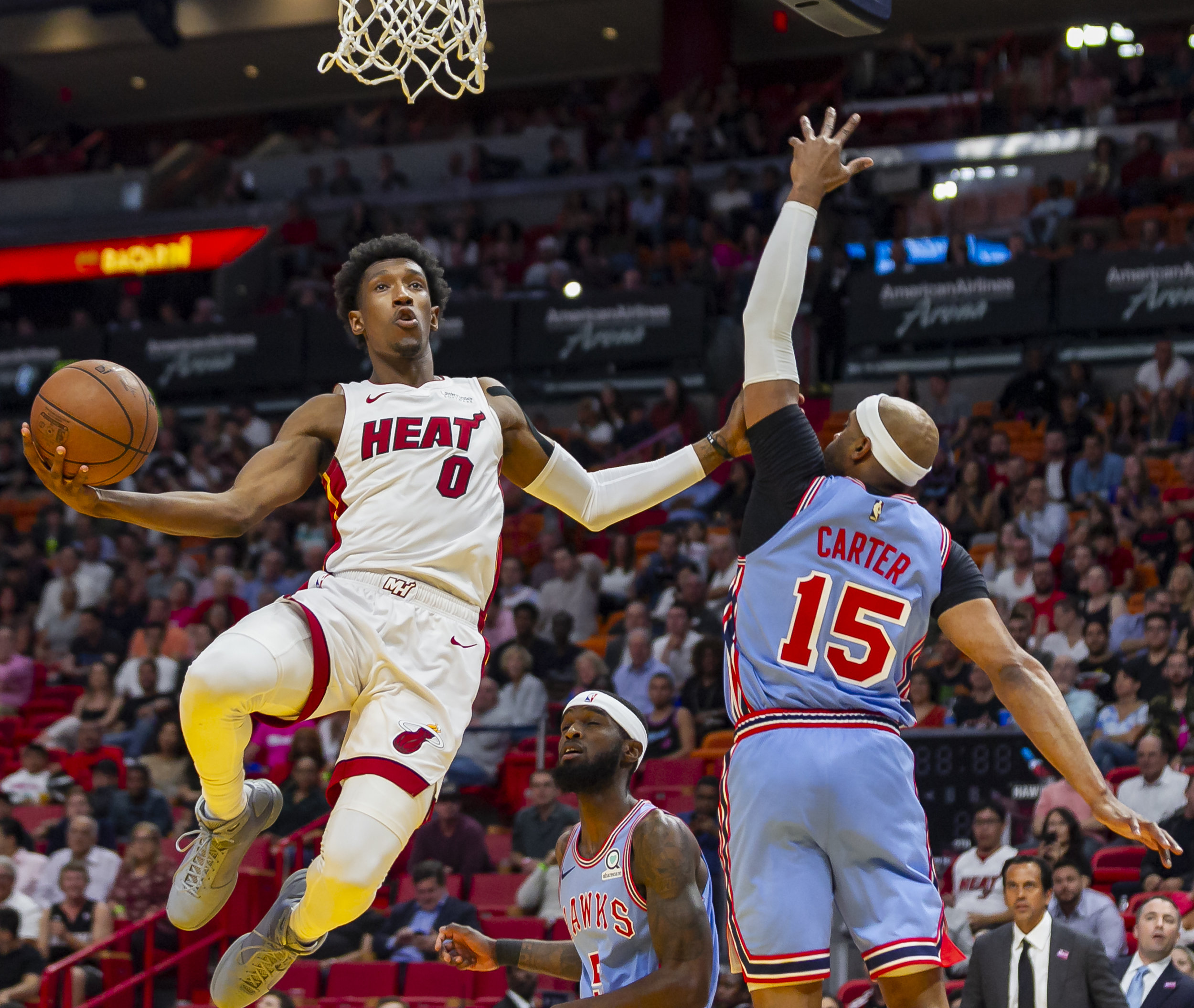 Miami Heat guard Josh Richardson (0) goes for an assist while Atlanta Hawks guard Vince Carter (15) tries to defend during the first quarter as the Miami Heat host the Atlanta Hawks at the AmericanAirlines Arena in downtown Miami on Monday, March 4,