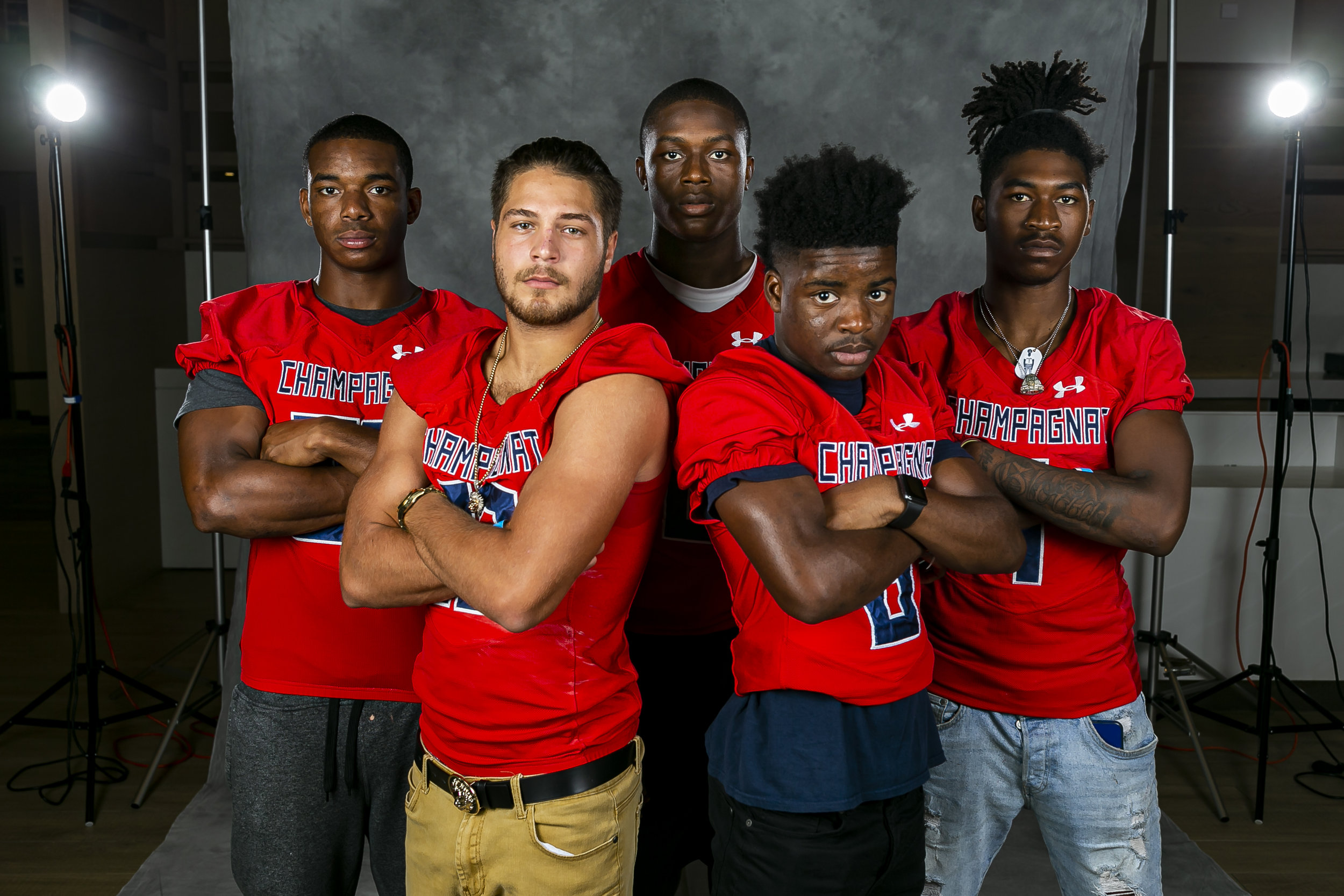  From left to right: Jesus Machado, Ryle Aguila, Jalen Harrell, Malik Rutherford and Johnquai Lewis from Champagnat Catholic High School, attend High School Football Media Day at the Hard Rock Stadium in Miami Gardens on Saturday, August 3, 2019. 