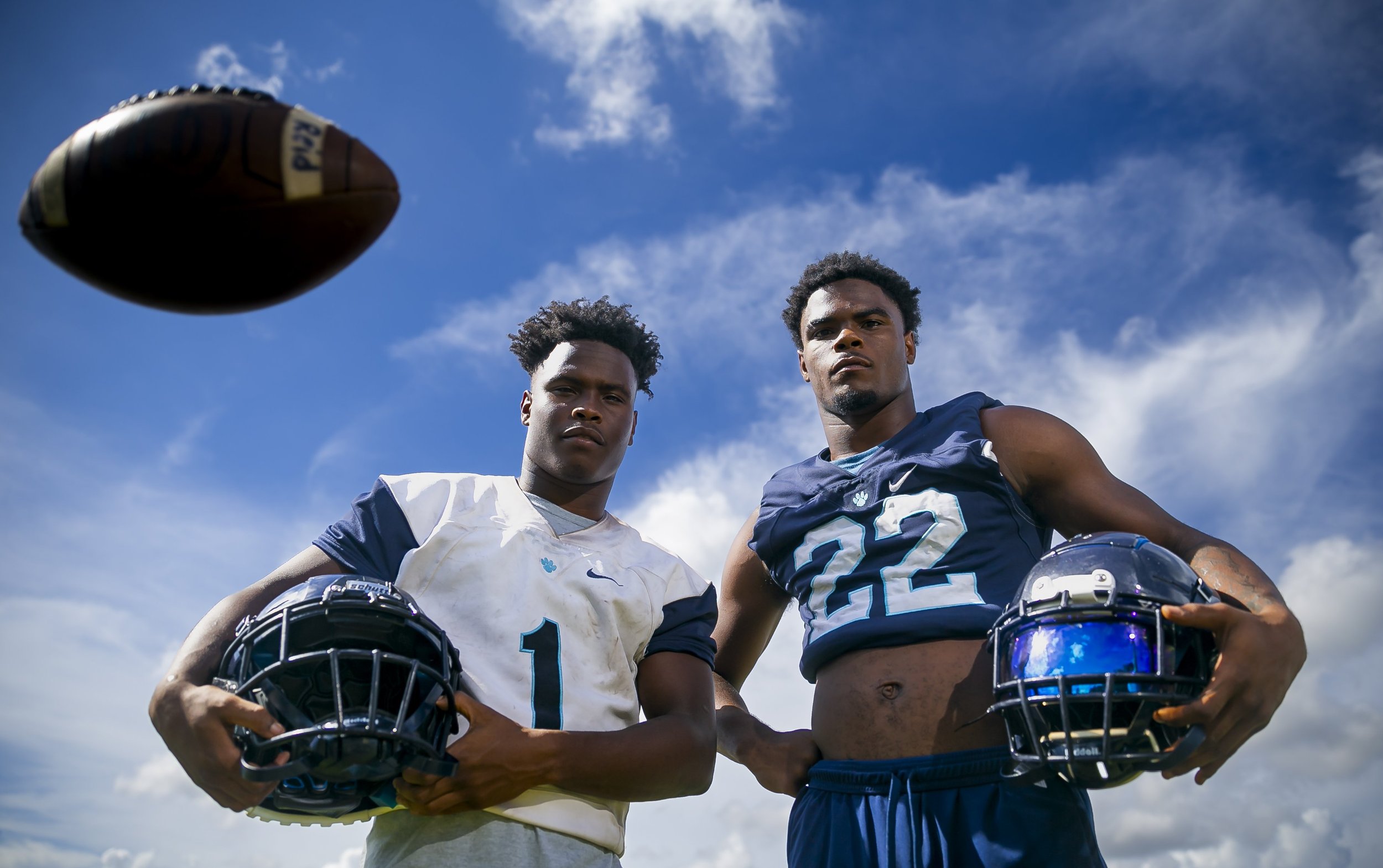  Miami Palmetto Senior High athlete Robby Washington, left, and his brother, linebacker Bobby Washington, are photographed before the start of a preseason practice at their school’s football field on Friday, Aug. 12, 2022, in Pinecrest, Fla.  