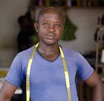 Emmanuel is our main tailor in Ghana. He cuts all the garments, and supervises his team of tailors & apprentices.