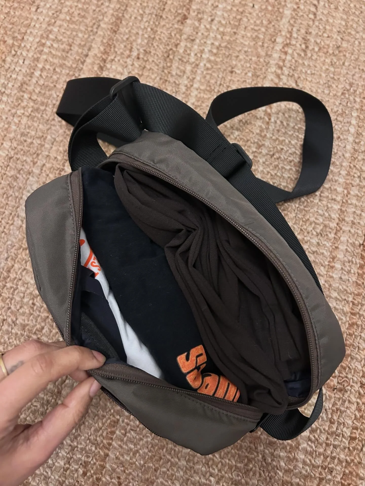 Packing for a trip and still, after 8 years of making these bags, I&rsquo;m still flabbergasted about the amount of things that fit into our Strap Bags. Literally just put two t-shirts, a pair of trousers and several pairs of underwear in there - and