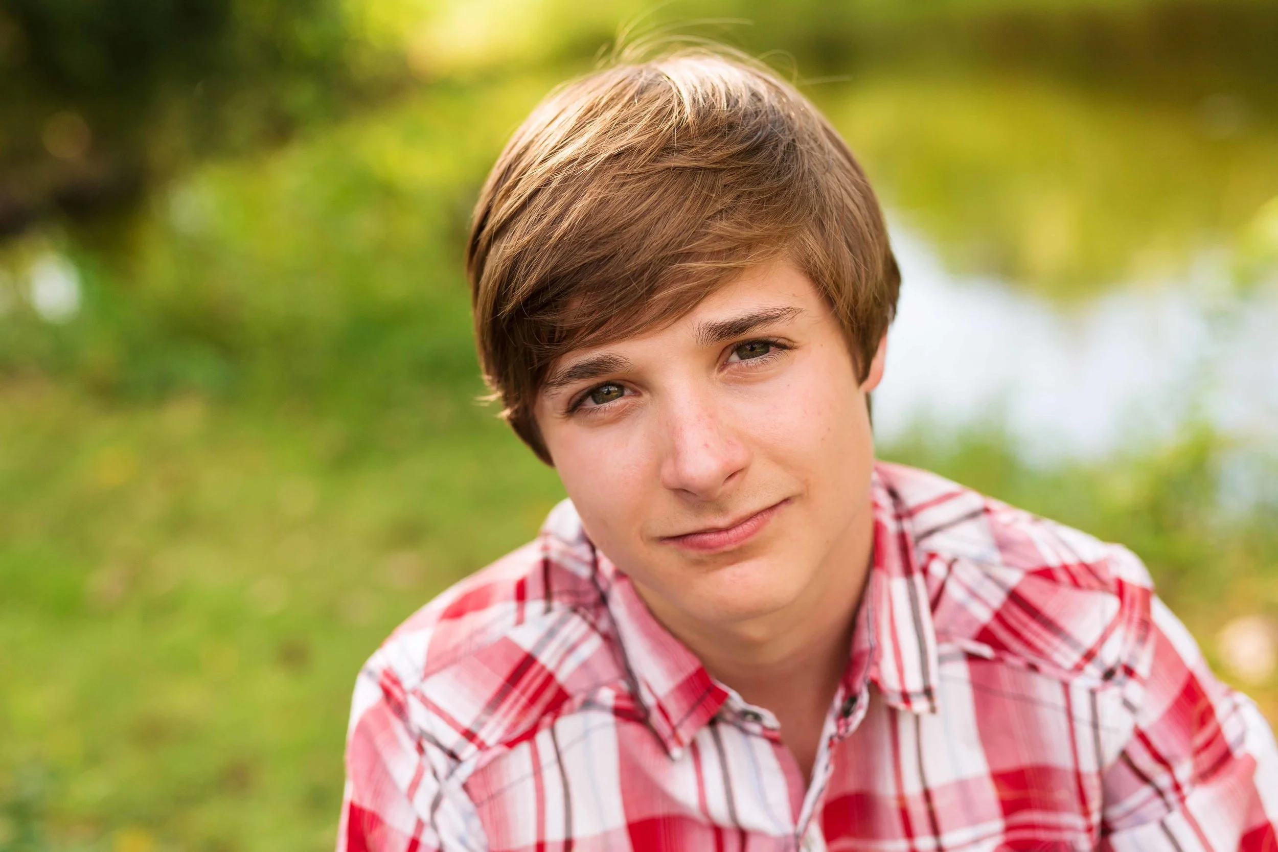 Truly You Photography Oklahoma tween boy in plaid shirt outside