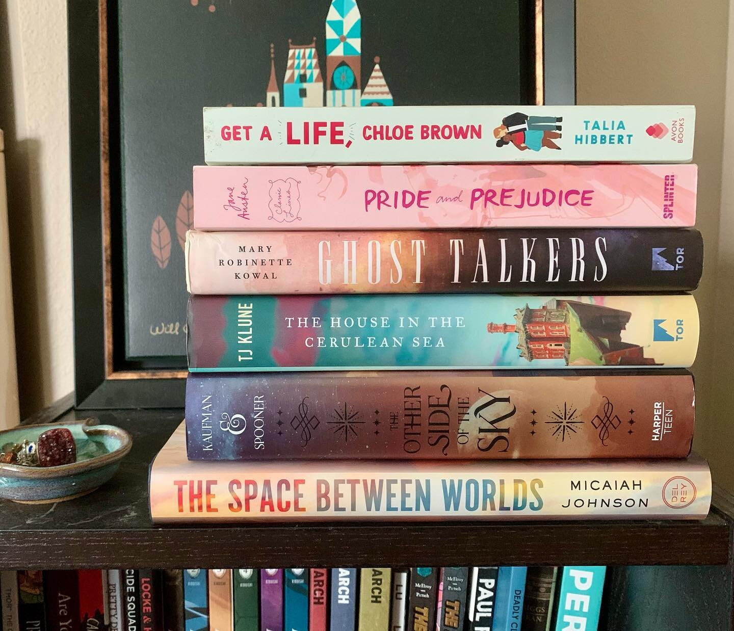 For Valentine&rsquo;s Day I, like lots of book people, decided to share a stack of books with romances I like! They are not all romance books, as a heads up, but they are all books I really loved! 

Ghost Talkers and The Space Between Worlds are the 