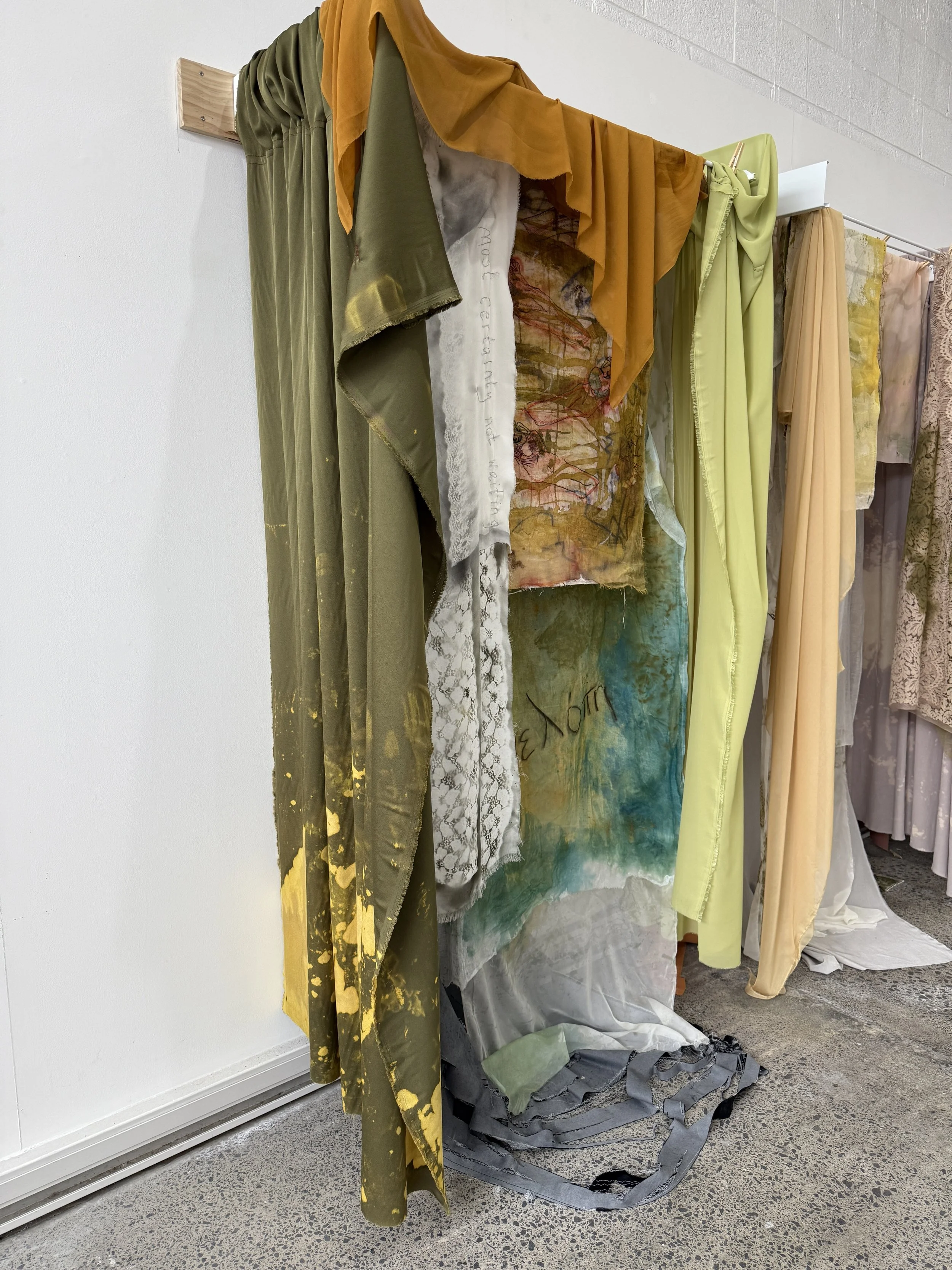 Grey serrated fabric symbolising the loom