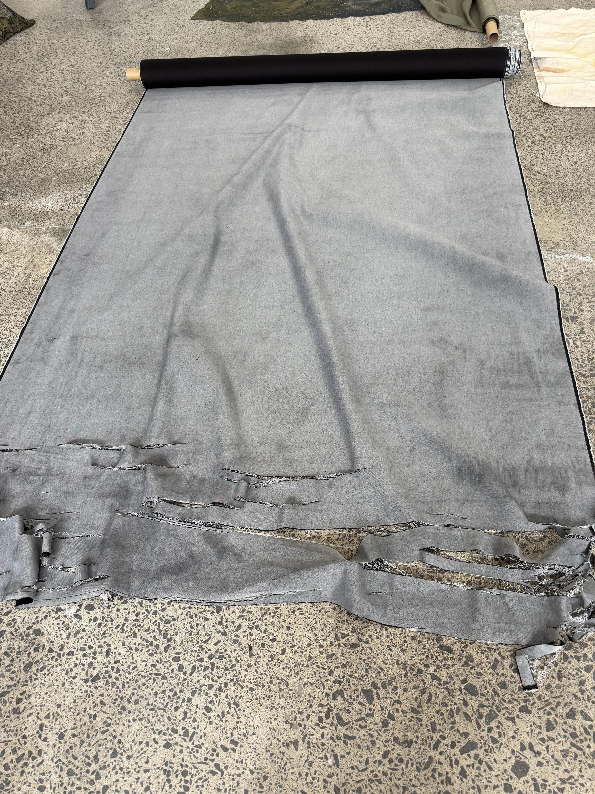 Faulty grey fabric with serrations