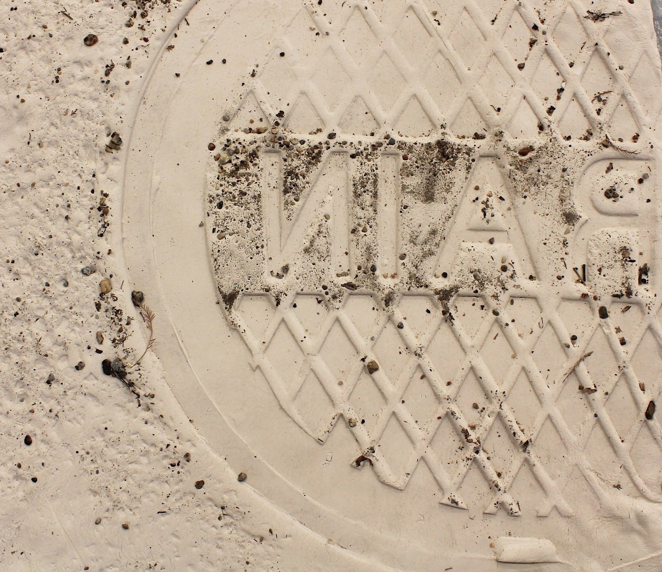  detail-unfired clay recording of local stormwater manhole cover  