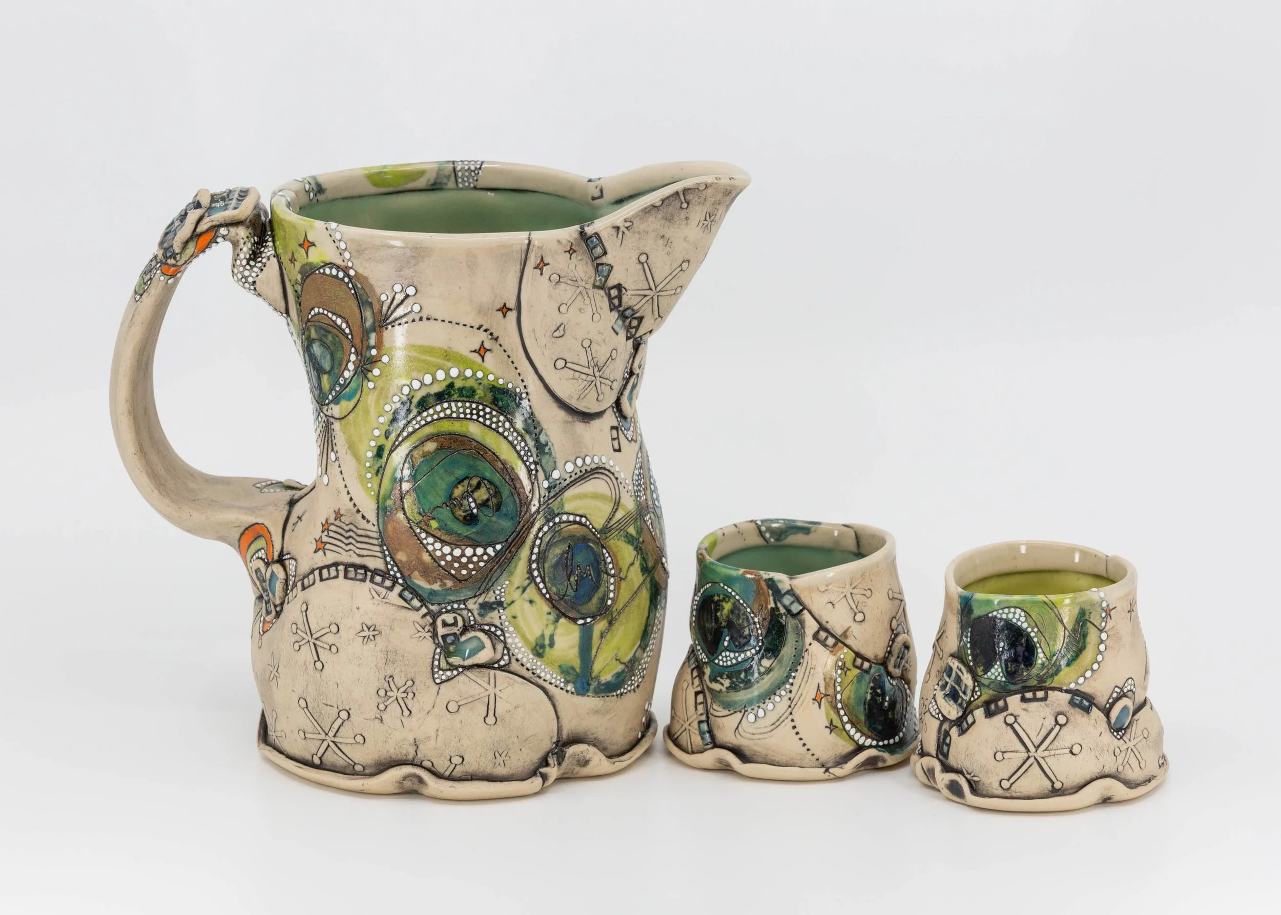 peacock pitcher and cups.jpg