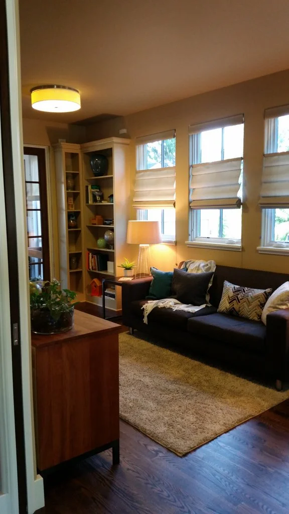Before: This space, connected to both living and dining by double pocket doors, formerly served as a TV room. We made it a multi-purpose office/ homework/ hang out space, which provides additional seating for entertaining as well.