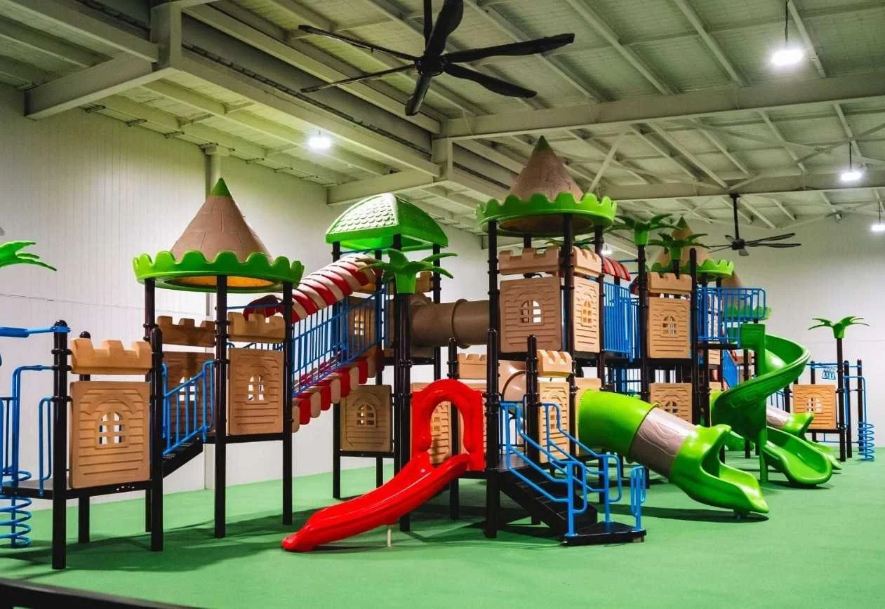 Indoor kids playground at Bligh Park Hotel featuring colorful slides, climbing structures and play equipment, ideal for family-friendly activities and school holiday fun in