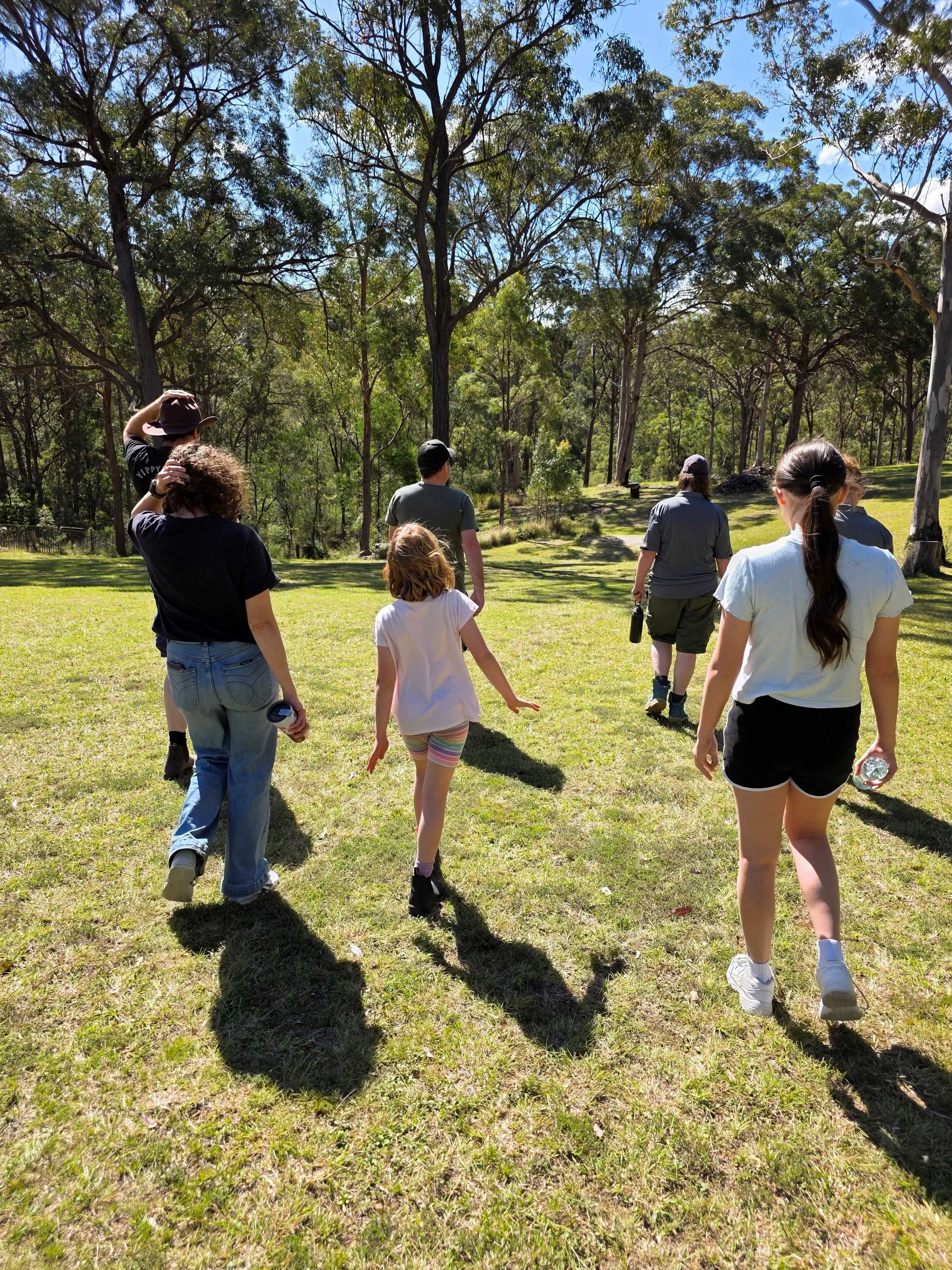 Family bushwalking through the Australian bush at Dido’s Place in East Kurrajong, Hawkesbury NSW