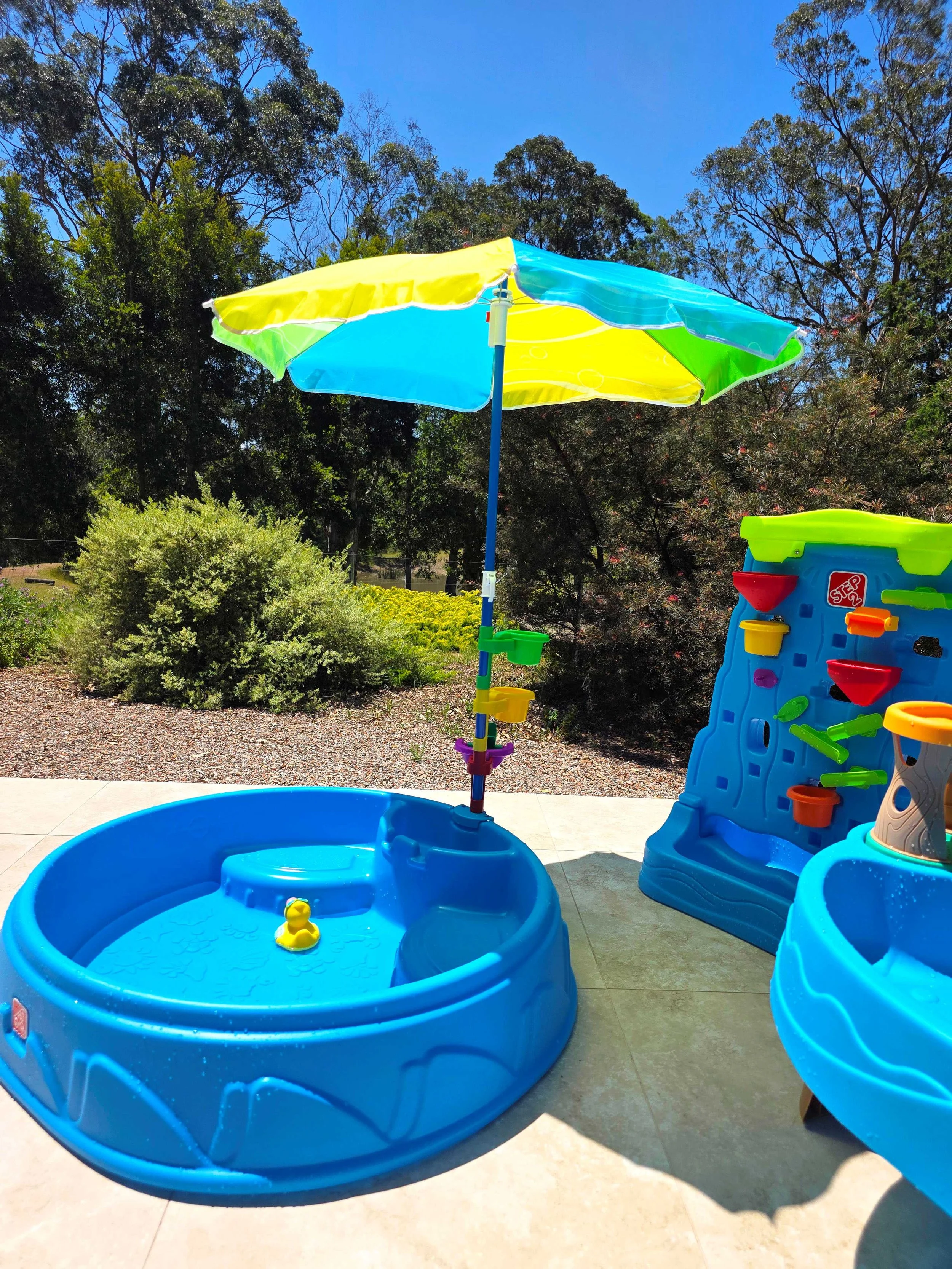 Kids Water Play Zone with toddler pool, splash table and waterfall discovery wall at Dido’s Place in the Hawkesbury NSW
