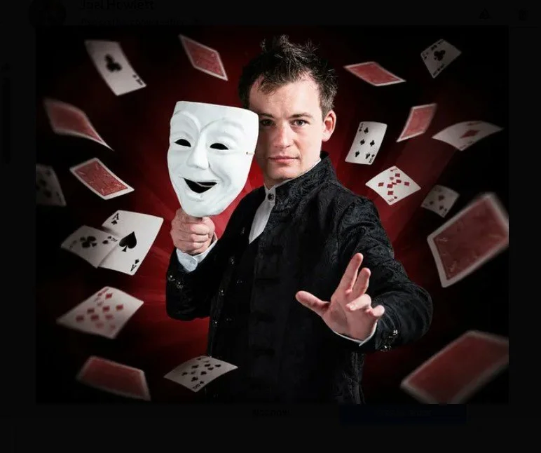 Magician performing sleight of hand magic with playing cards at JD’s World of Magic, Richmond NSW