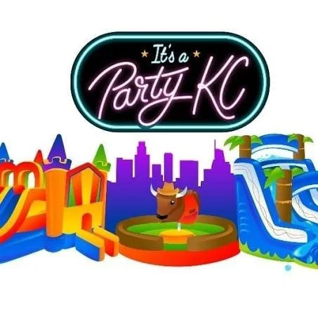 Colorful indoor amusement park with inflatable bounce houses, a small animal carousel, and a large city skyline backdrop. Neon sign reads 'It's a Party KC'.