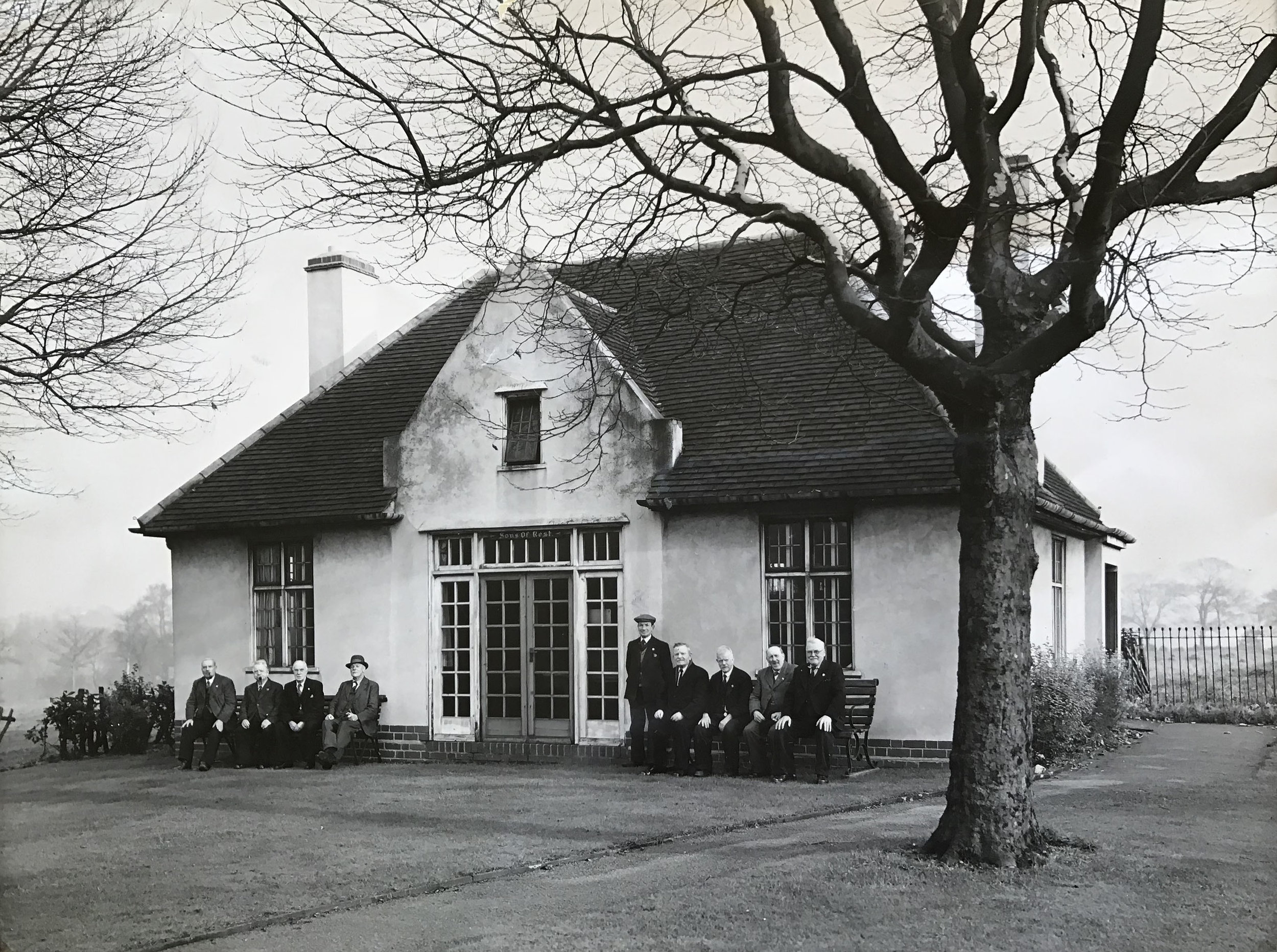 (SoR) Members of the Sons of Rest outside the building.jpg