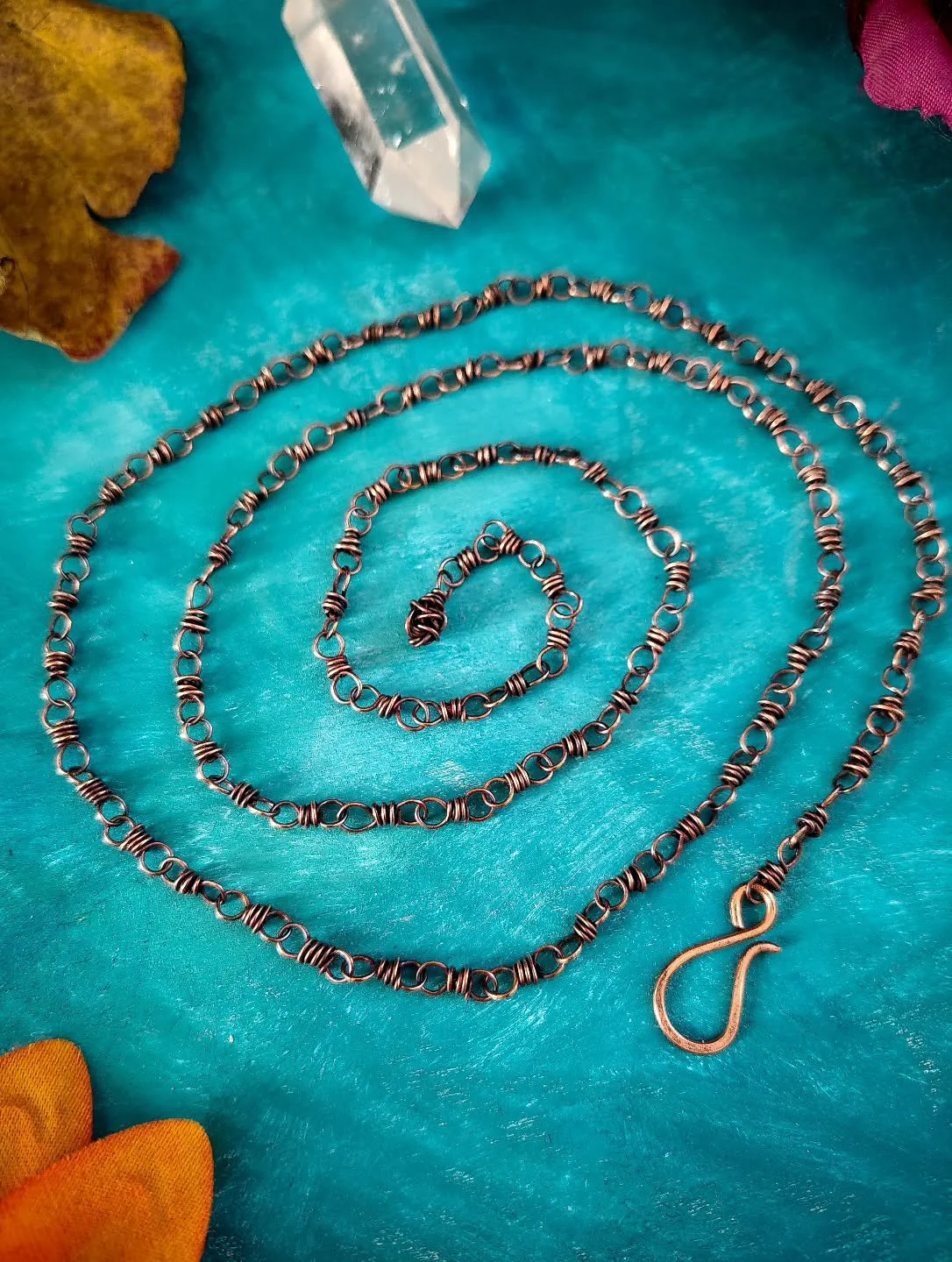 Comfort these days also looks like this.
A copper chain, each link handmade.
.
To stop making jewelry left a hole in my heart...and while I can't afford silver anymore, I can walk back to my beginnings, when my jewelry was copper wire woven around ge