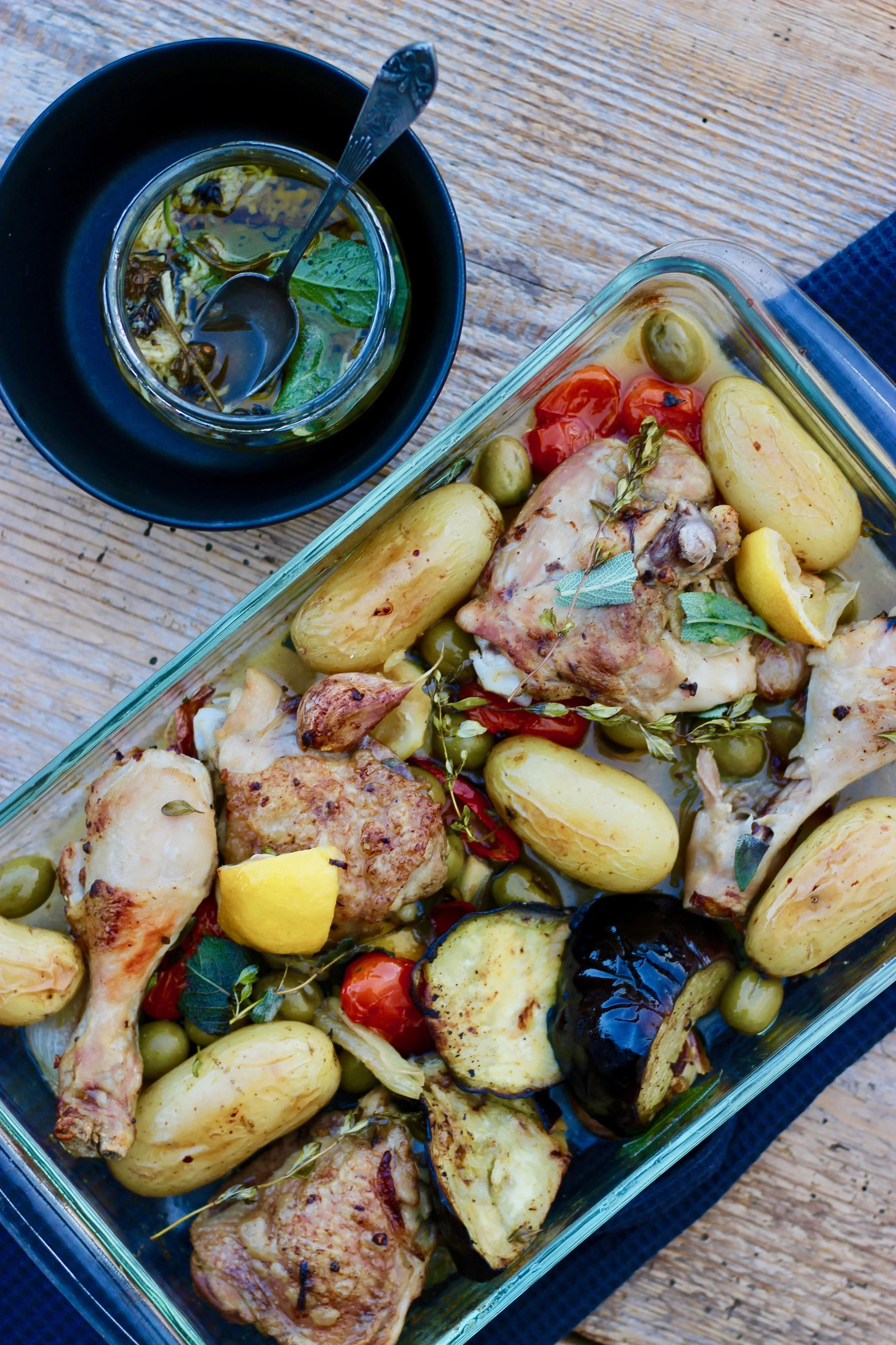 Oven baked chicken in herbs and veggies
