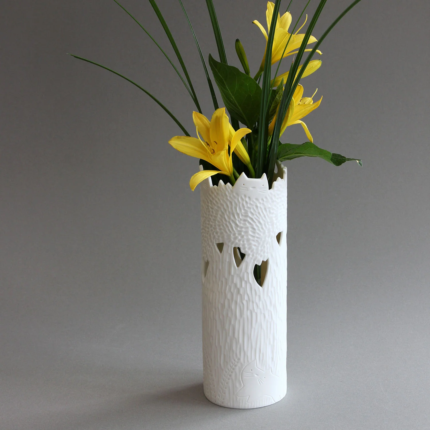 Vase arbre tronc fleurs.jpg
