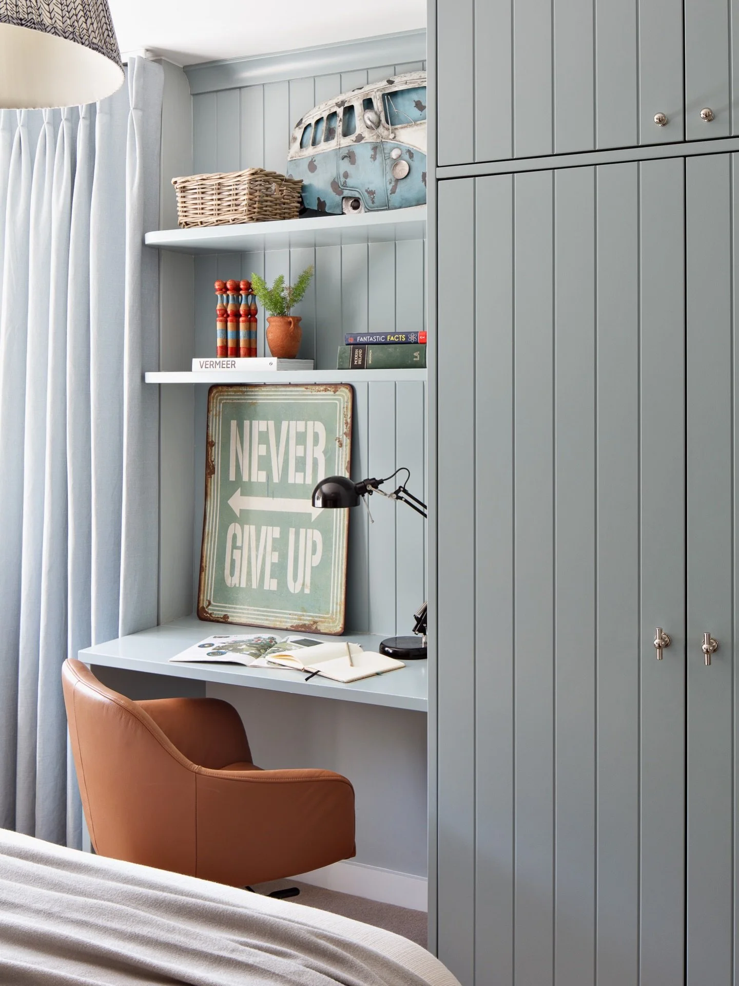 A small corner from our Wildwood project.

We needed this wall to do a lot, so we designed it as one continuous piece of joinery. Wardrobe, desk and shelving, all working together rather than competing for space.

The vertical panelling keeps it feel