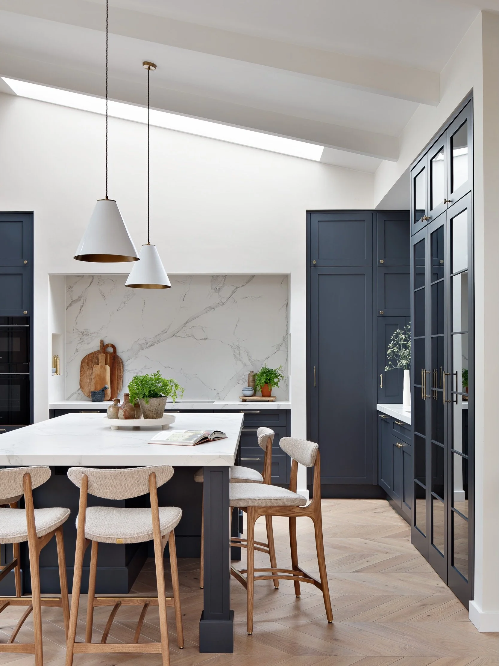 Modern Calm at our Wildwood House project 

An existing house meets a large contemporary extension, creating a light-filled family home that connects the character of the original with a more modern way of living.

The interiors were designed for a y