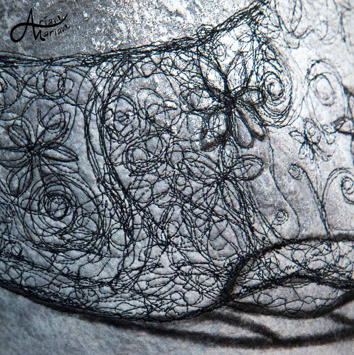 1-close-up-embroidery-on-handpainted-felt.jpg