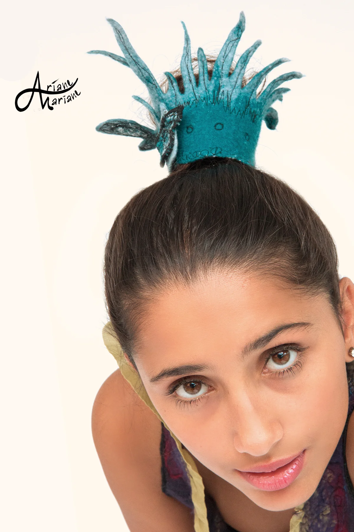 hair-bun-with-sculptural-felt-bracelet.jpg