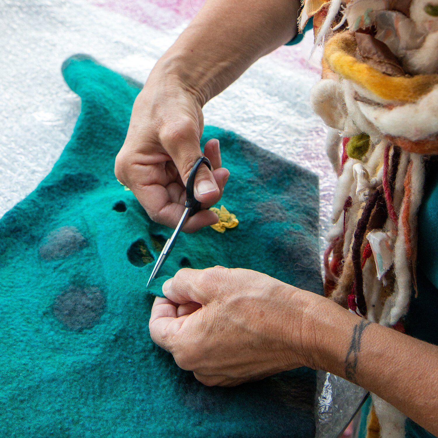 cutting-forms-into-felted-surface.jpg