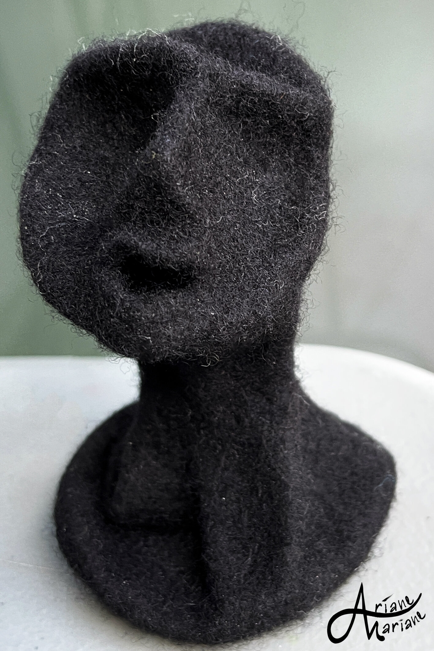 black-peanut-felt-sculpture-guy-23.jpg