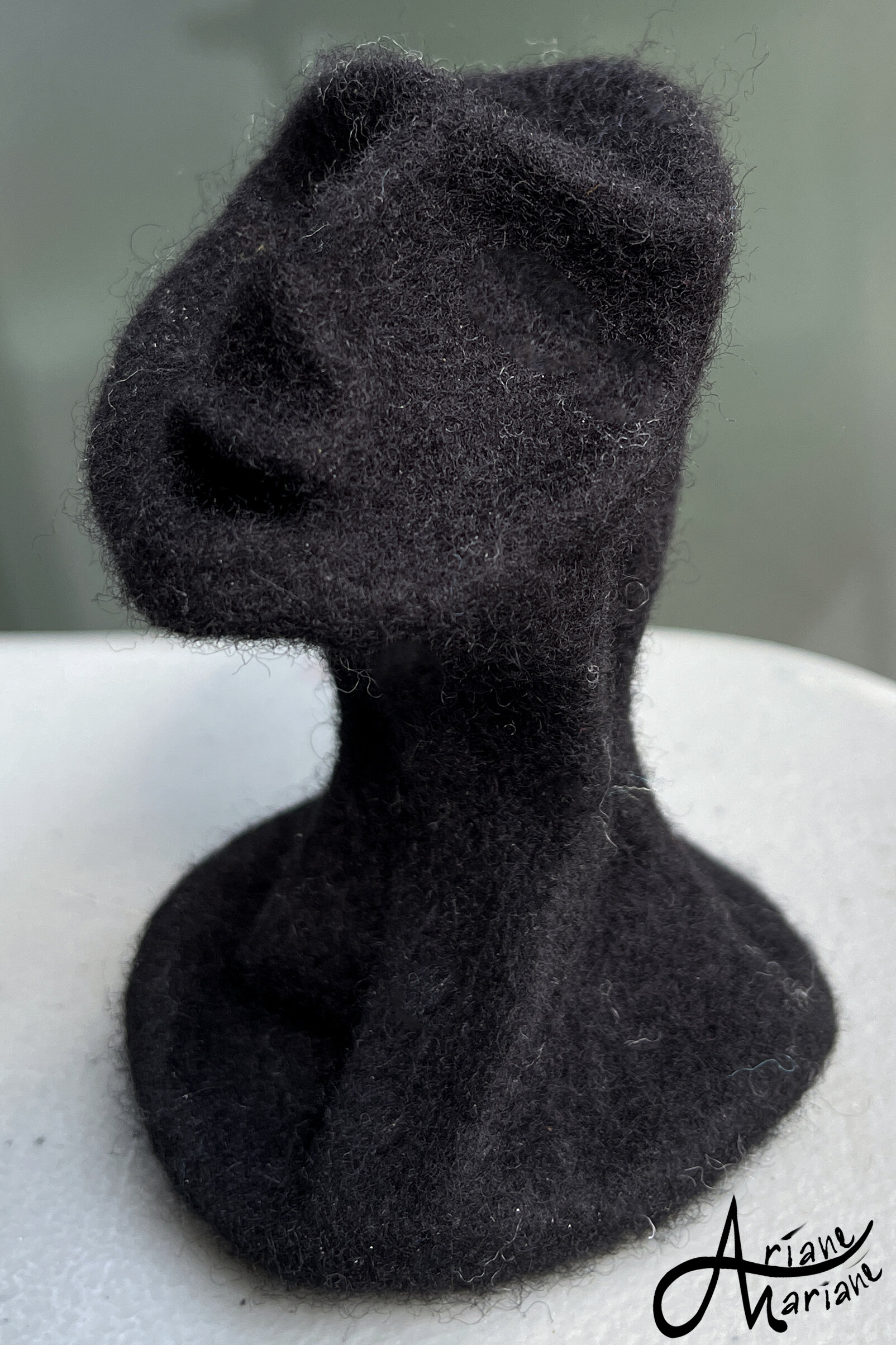 black-peanut-felt-sculpture-side-view-23.jpg